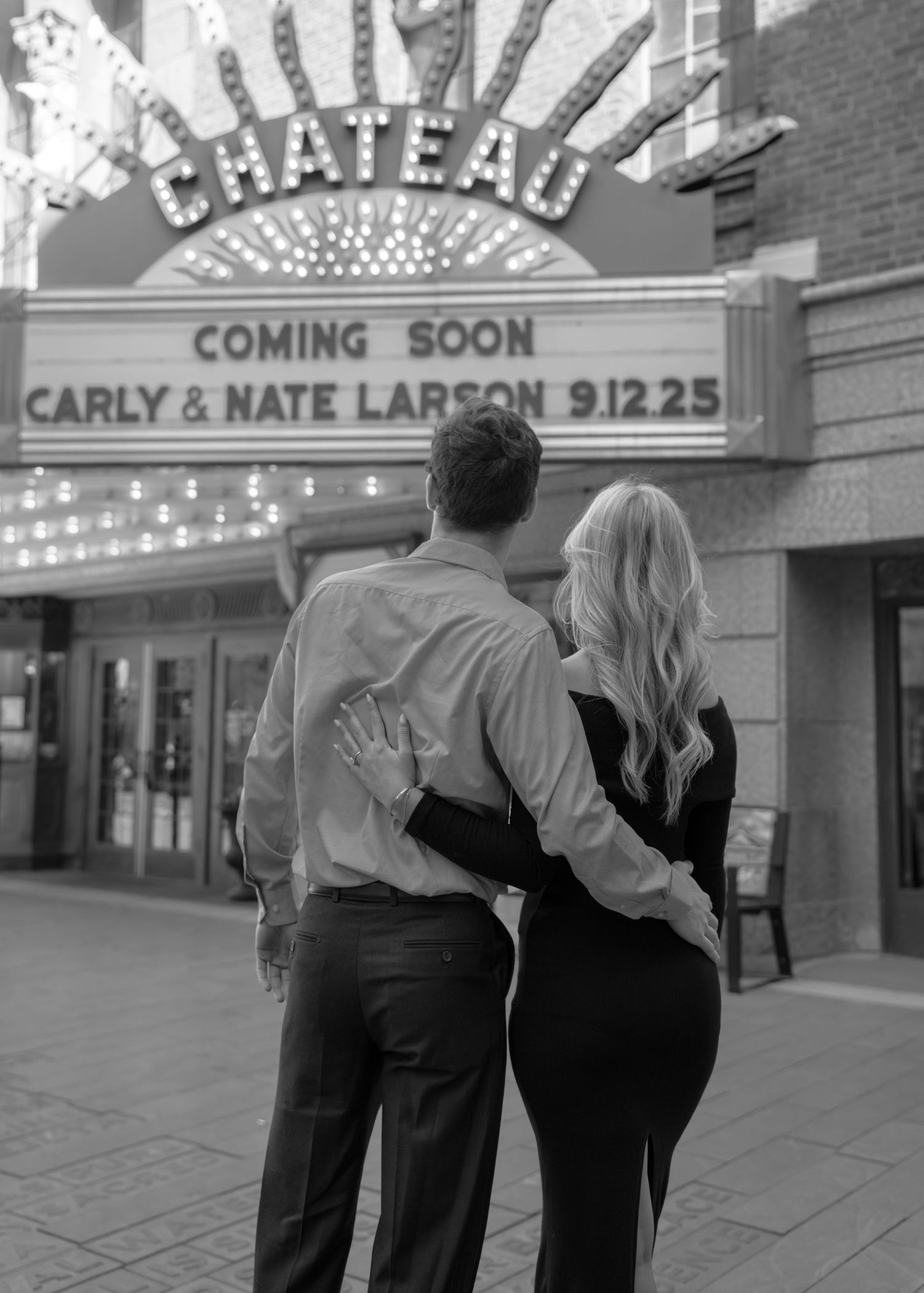 Black and white photo sequence of a couple walking past a vintage theater marquee.