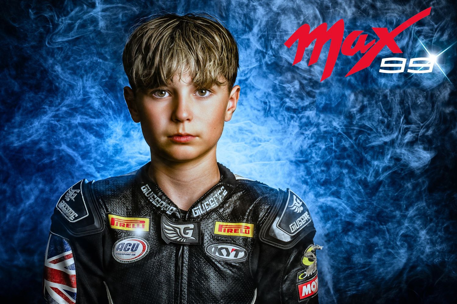 Young motorbike racer in leather suit with Max 99 branding poses against a dramatic blue smoky background.
