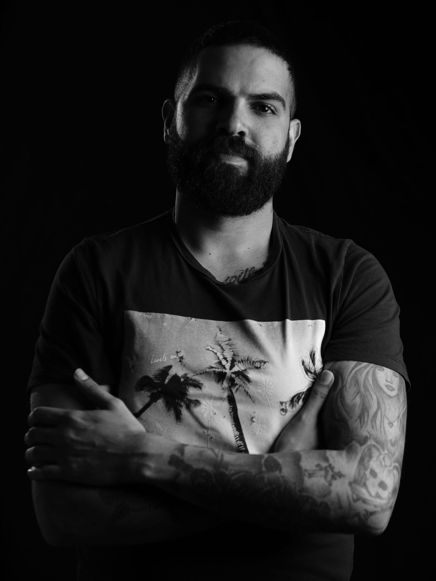 Handsome Lebanese young man photoshoot in black and white at CMA Productions Beirut