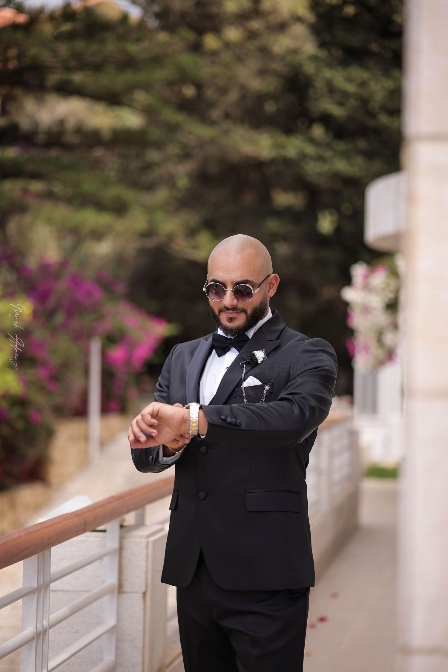 Handsome Lebanese groom checking his watch