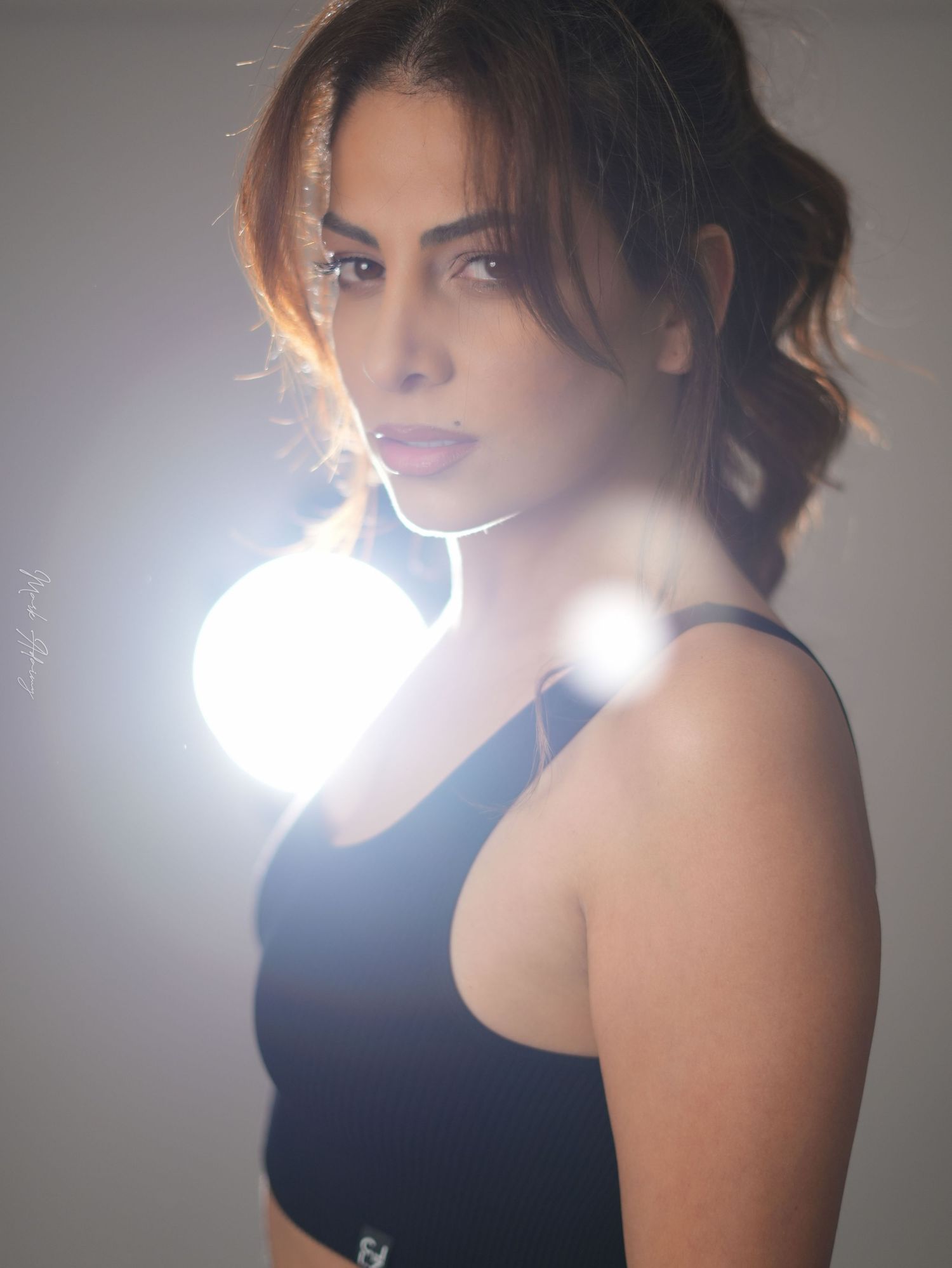 Lebanese young model with artistic lights at CMA Productions Beirut