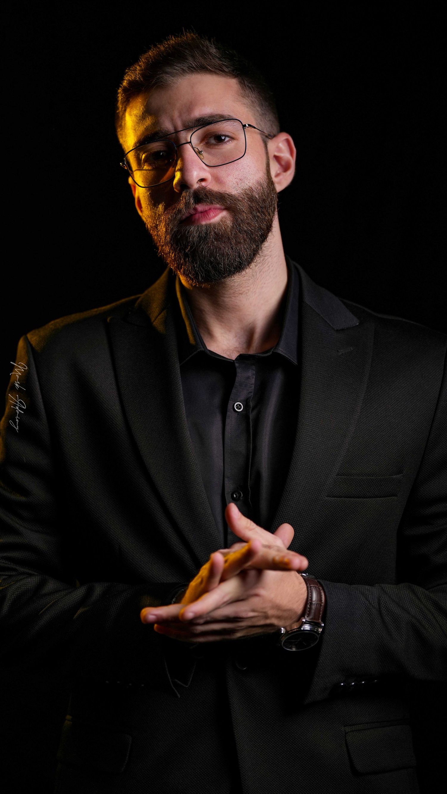 Lebanese male model in a black suit at CMA Productions Beirut