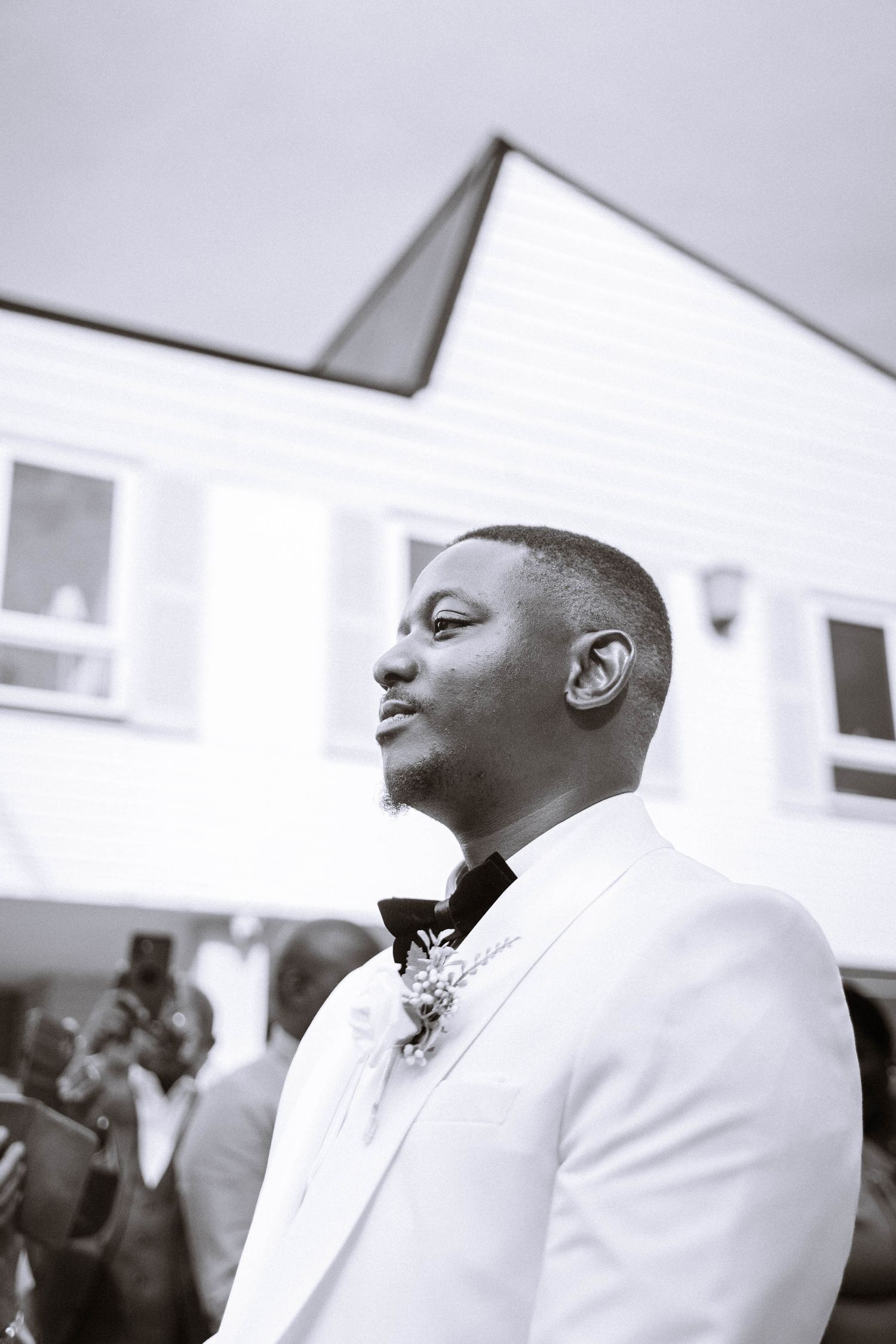 Ravens Ait wedding groom portrait black and white candid moment London wedding photography