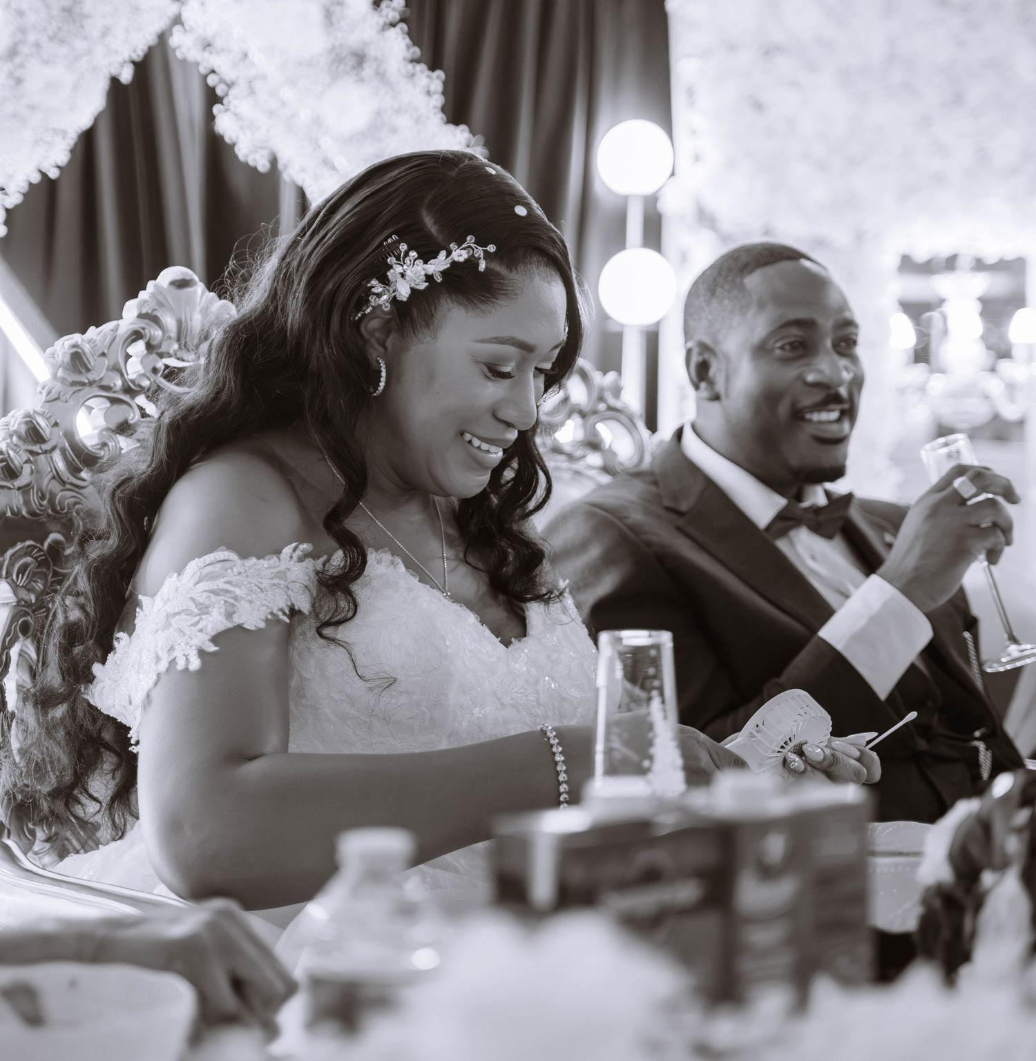 Jamaican wedding reception Birmingham bride and groom laughing during speeches candid documentary style wedding photography