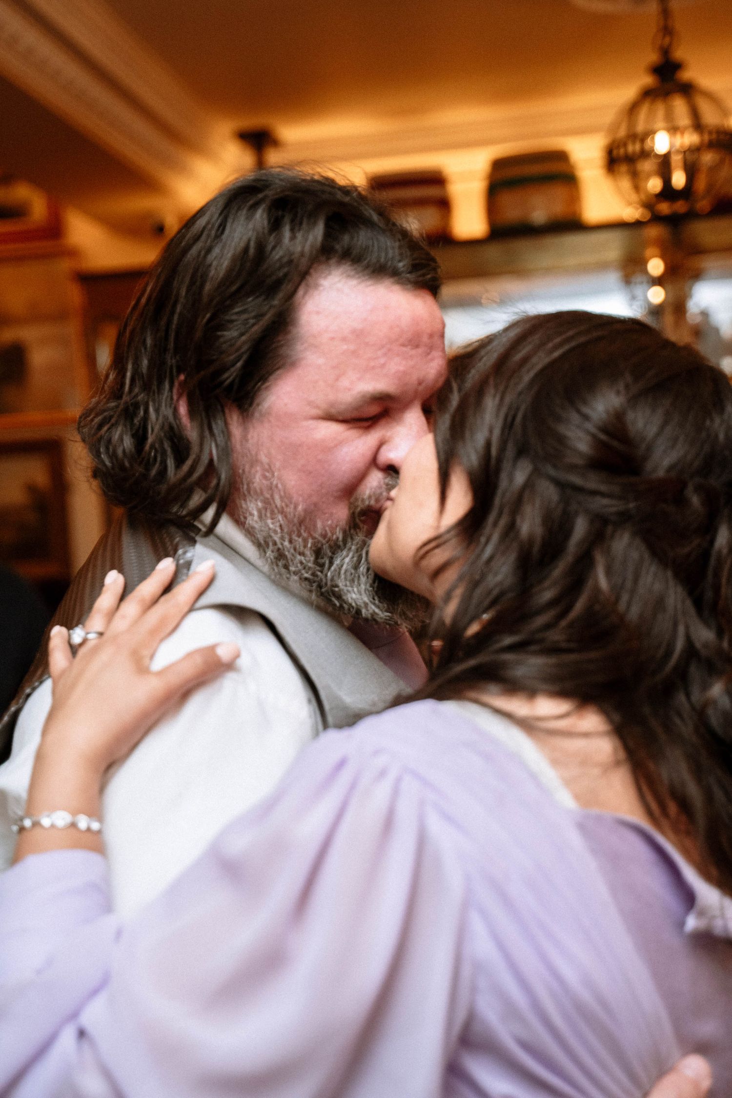 Couple sharing intimate moment during Trafalgar Tavern wedding reception in London