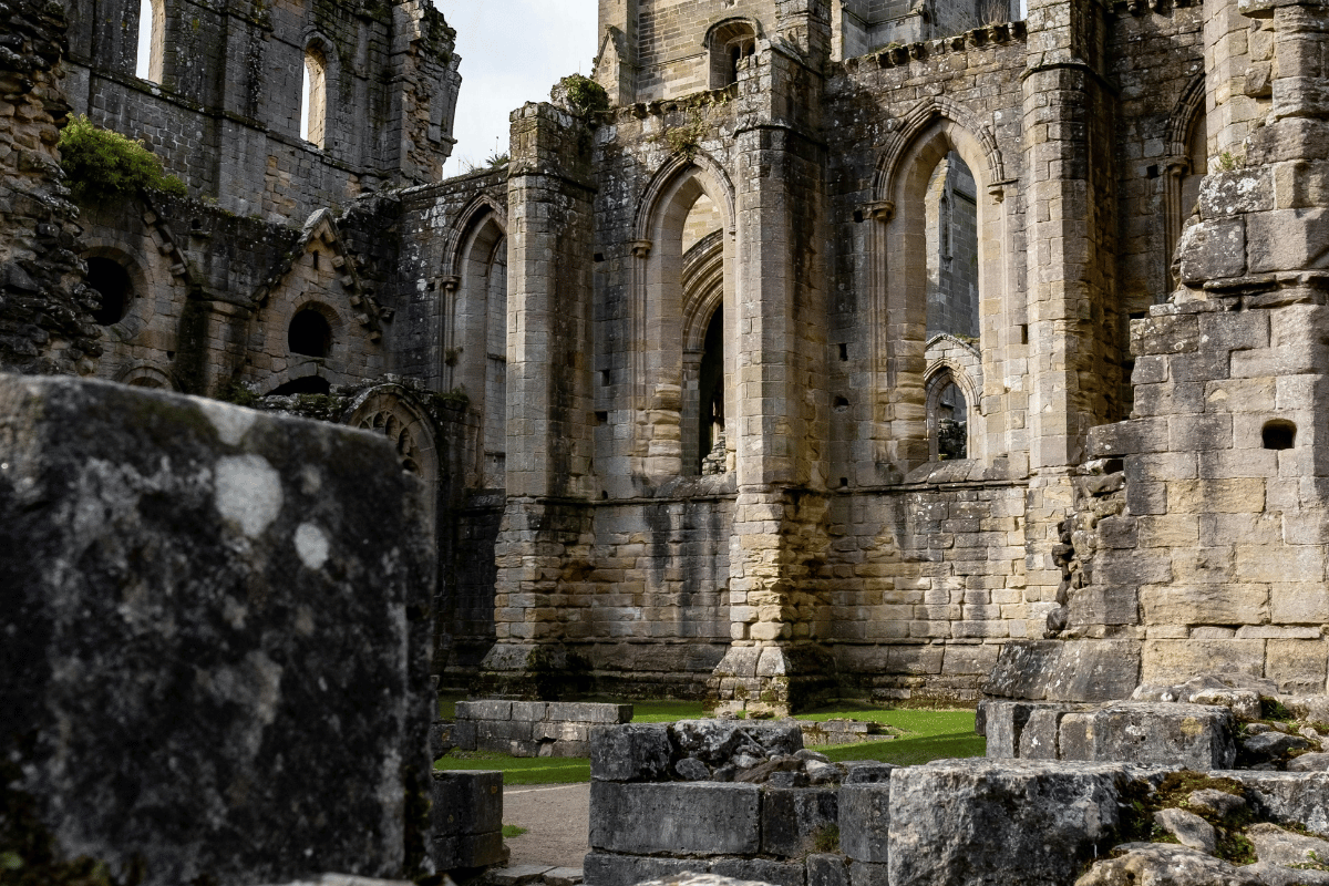 Tintern Abbey ruins in Monmouthshire Wales with gothic stone arches and columns