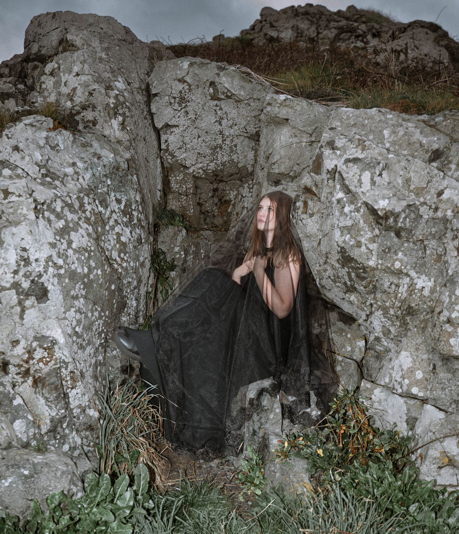 Gothic Bride during a Cornwall Elopement looking up