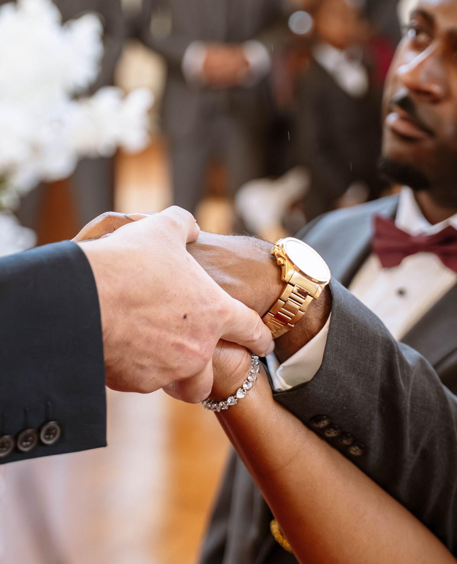 Birmingham Jamaican church wedding ceremony close up ring exchange hands detail emotional moment during vows