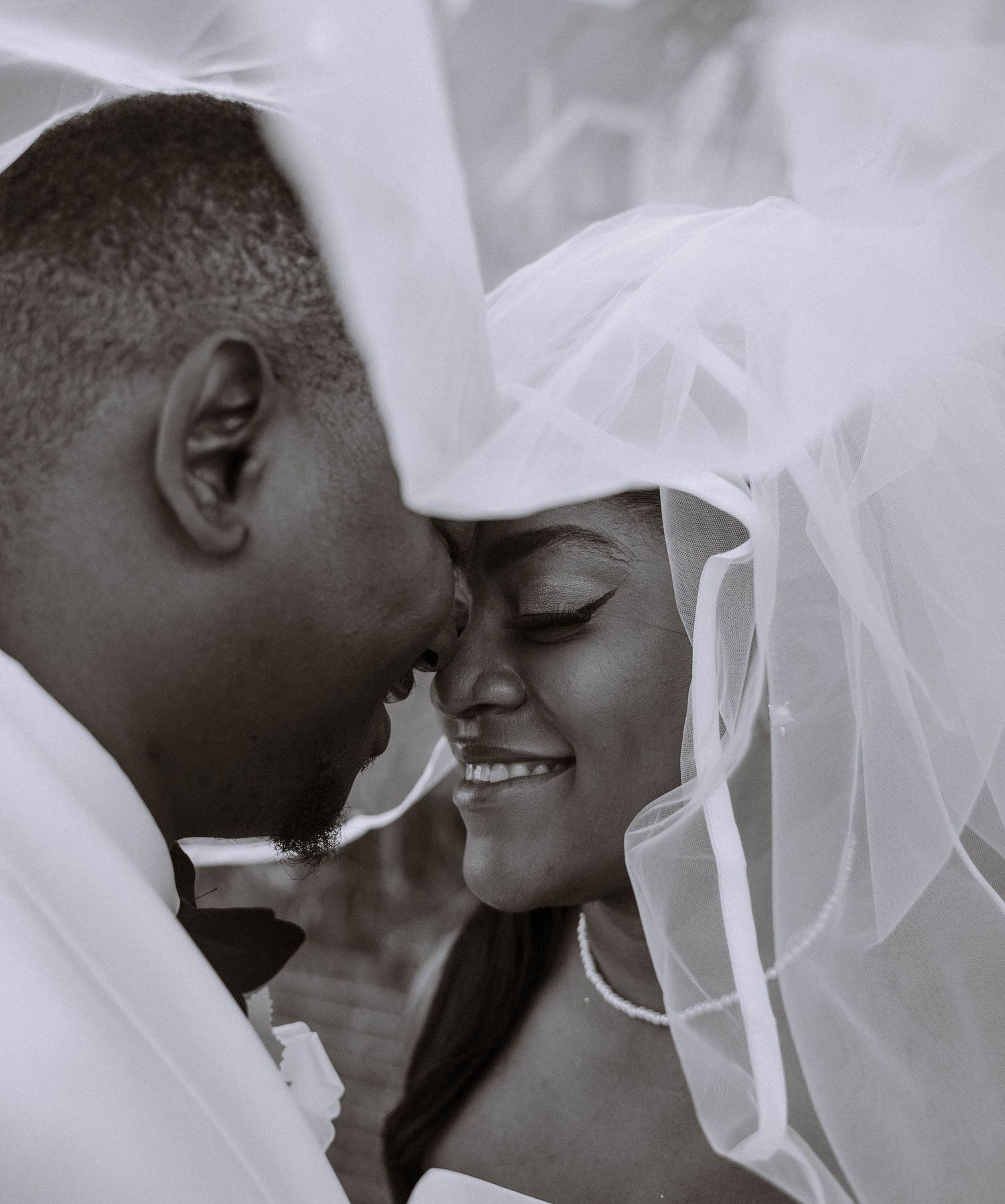 Ravens Ait wedding London couple portrait under veil intimate black and white moment during riverside ceremony