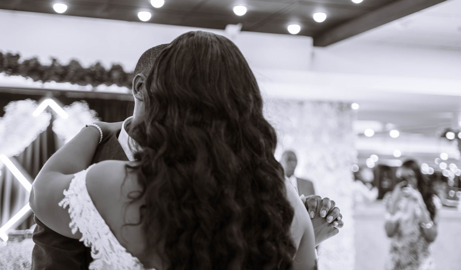 Birmingham Jamaican wedding reception candid of first dance from behind with long hair capturing movement and atmosphere