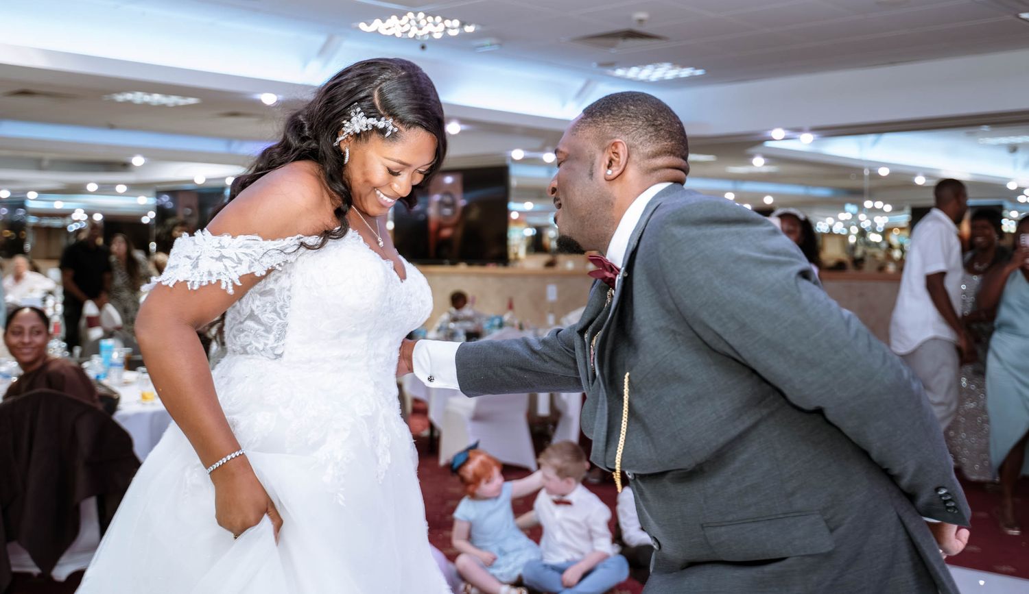 Bride and groom dancing together during Jamaican wedding reception in Birmingham