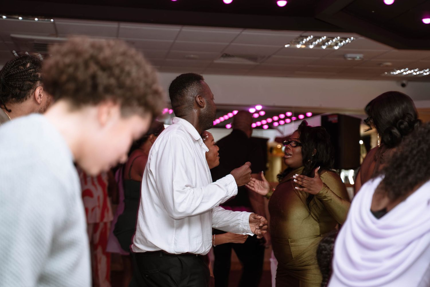 Guests dancing during Jamaican wedding reception in Birmingham