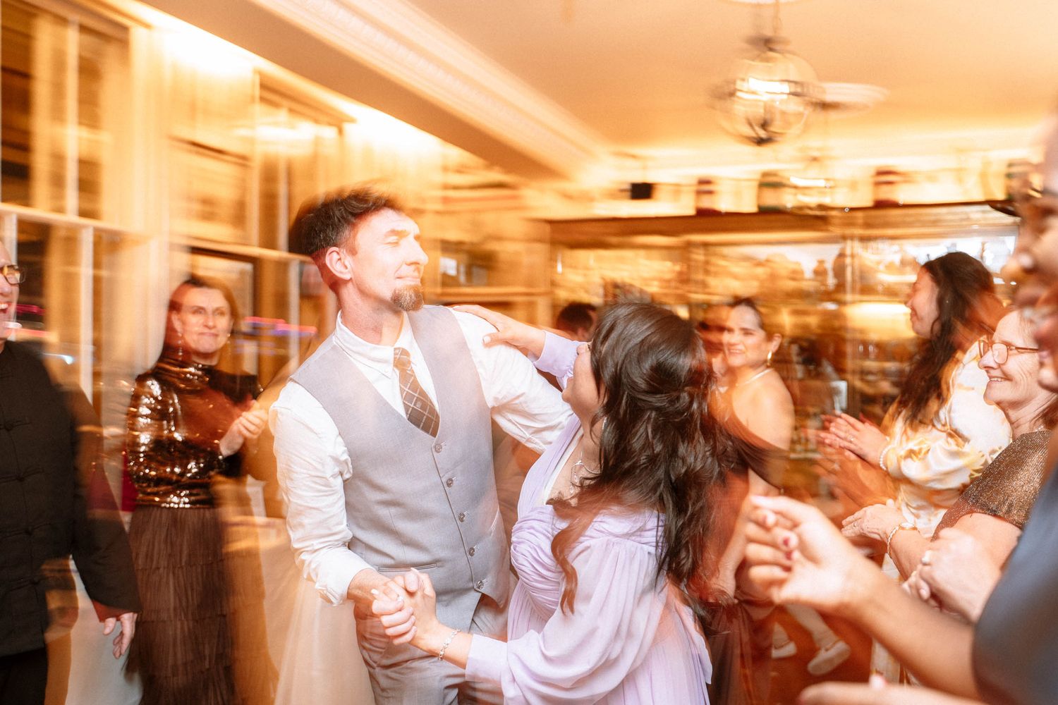 London LDS wedding reception Trafalgar Tavern dance floor candid guests dancing lively evening celebration