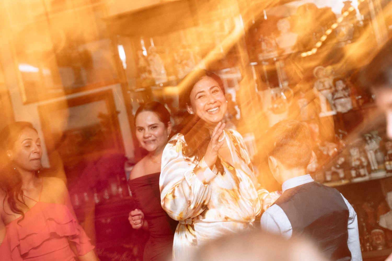 Guests dancing with motion blur during Trafalgar Tavern wedding reception in London