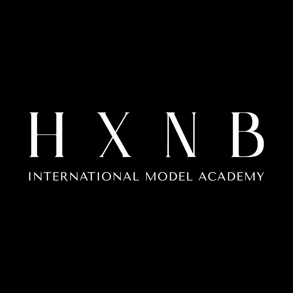 HXNB International Model Academy logo in white text on black background.