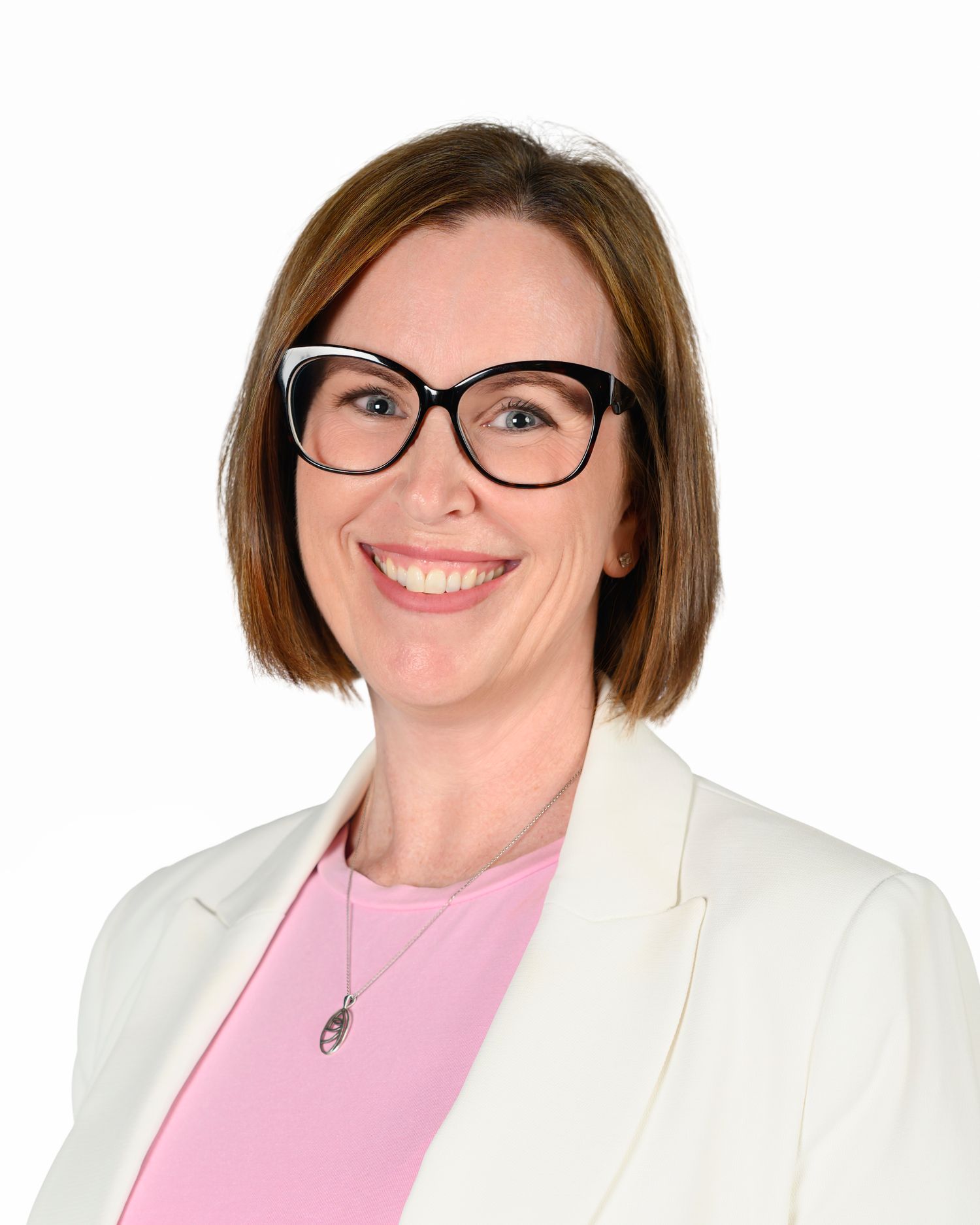 Professional headshots of a woman in white blazer and pink top with glasses.