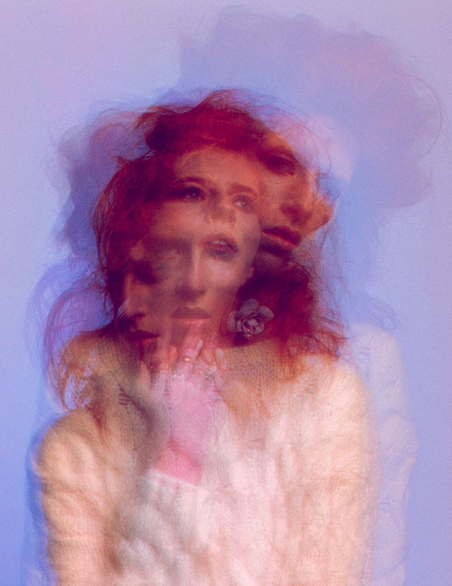 Abstract portrait with purple tones showing multiple exposure motion blur effect.