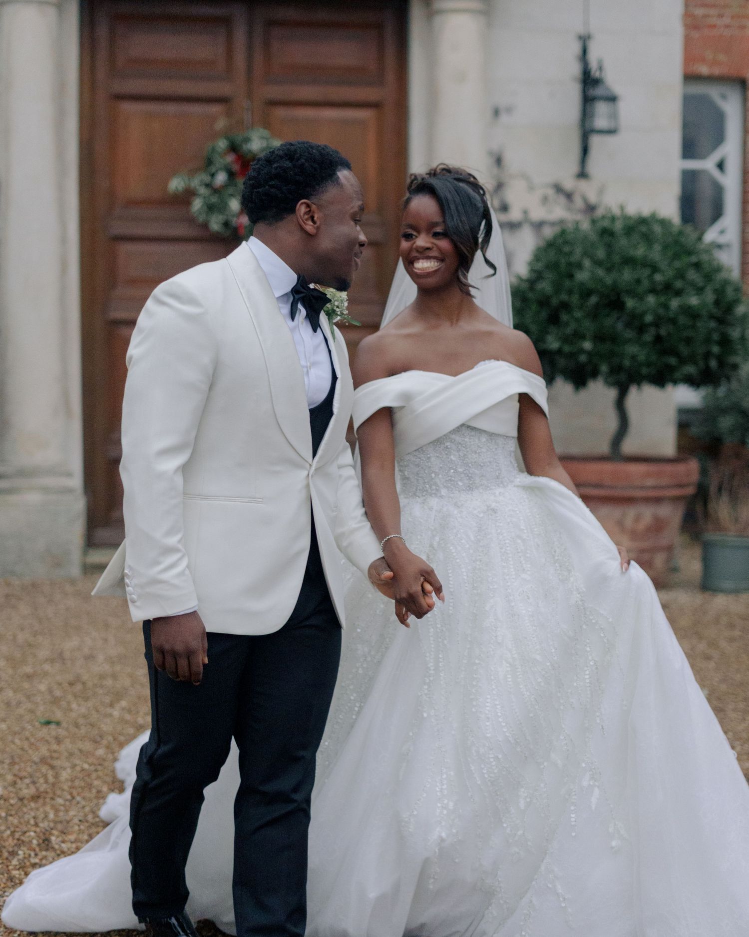 groom walking with her bride