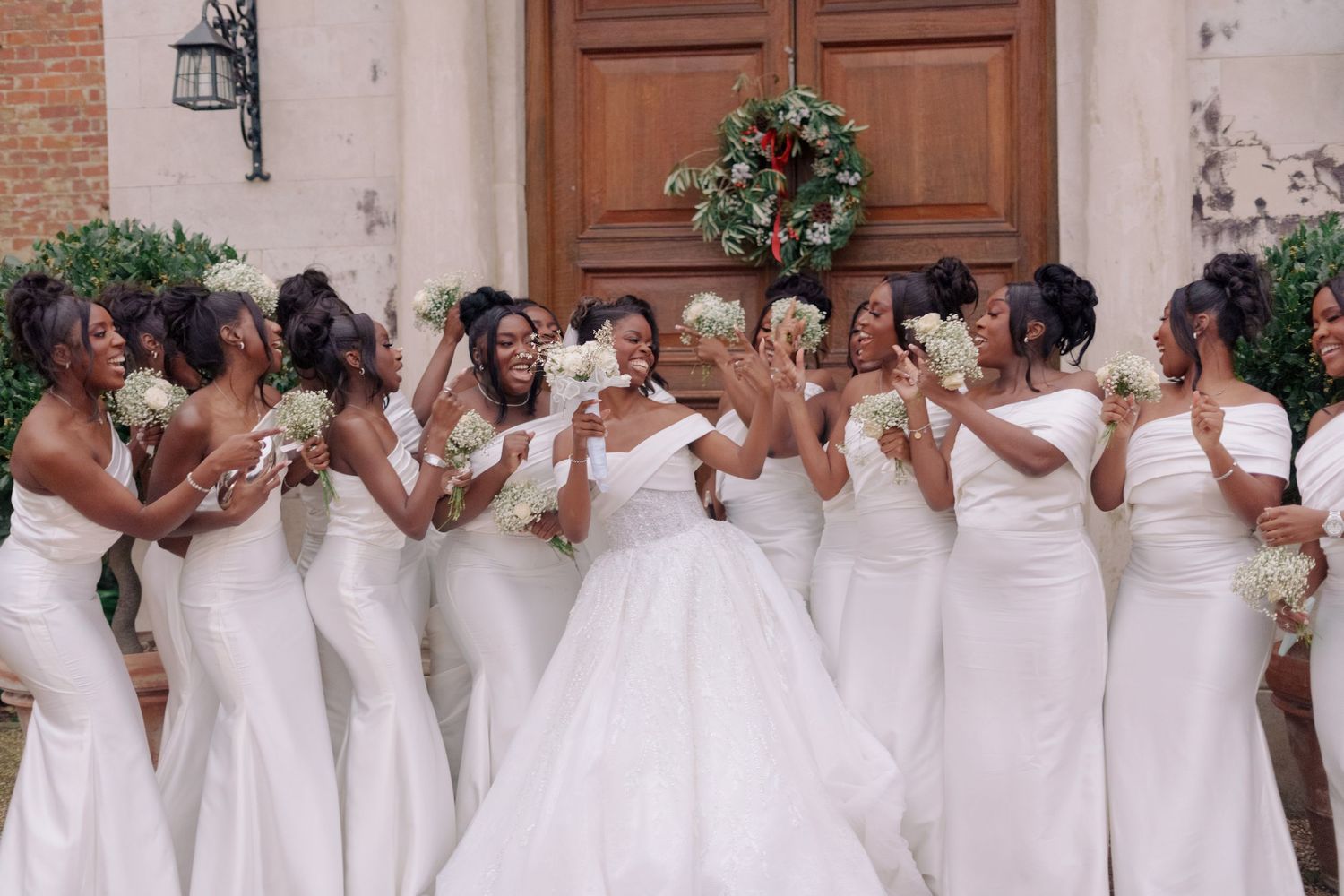 bride and her girls posing for a picture.