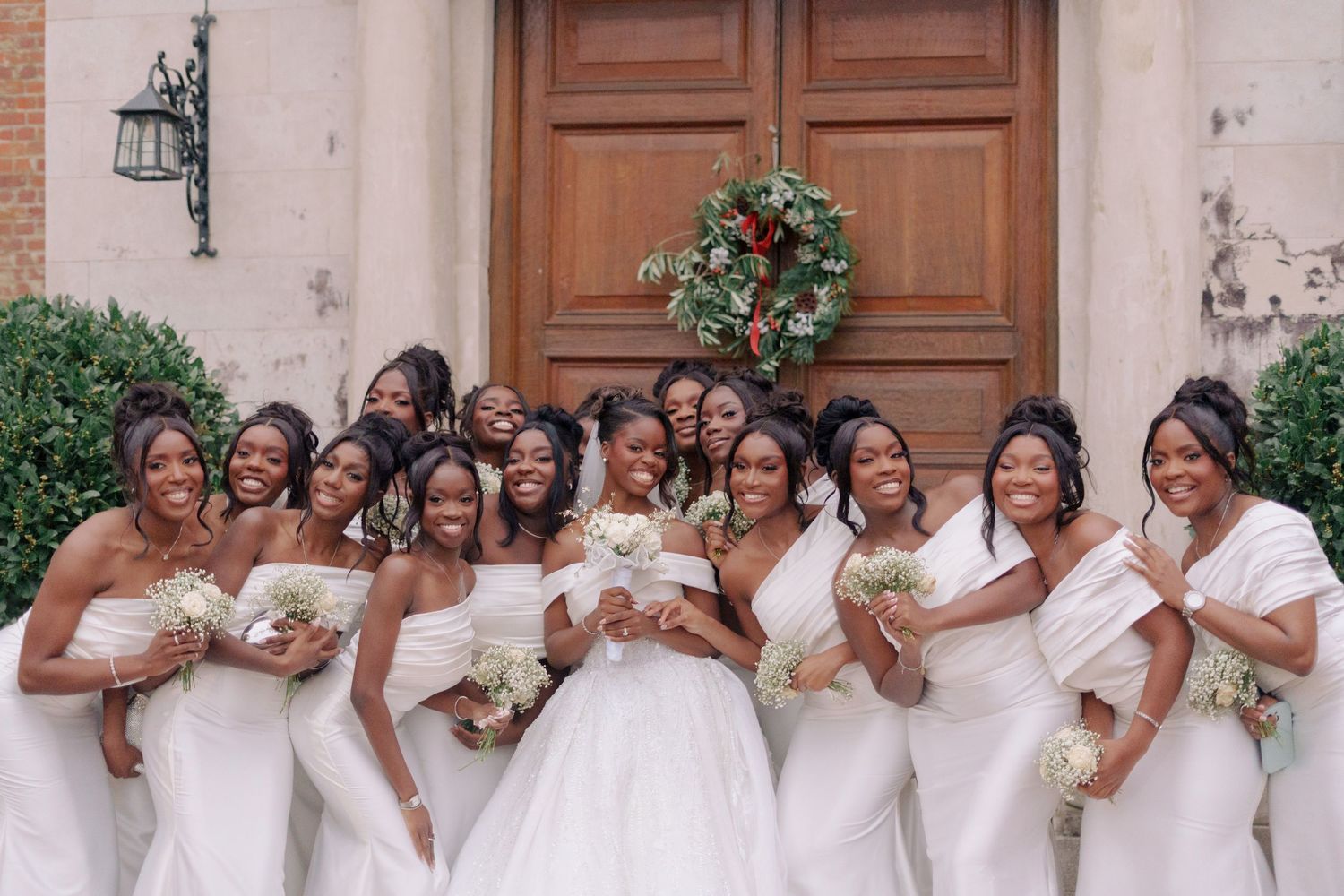 bride and her girls posing for a picture.