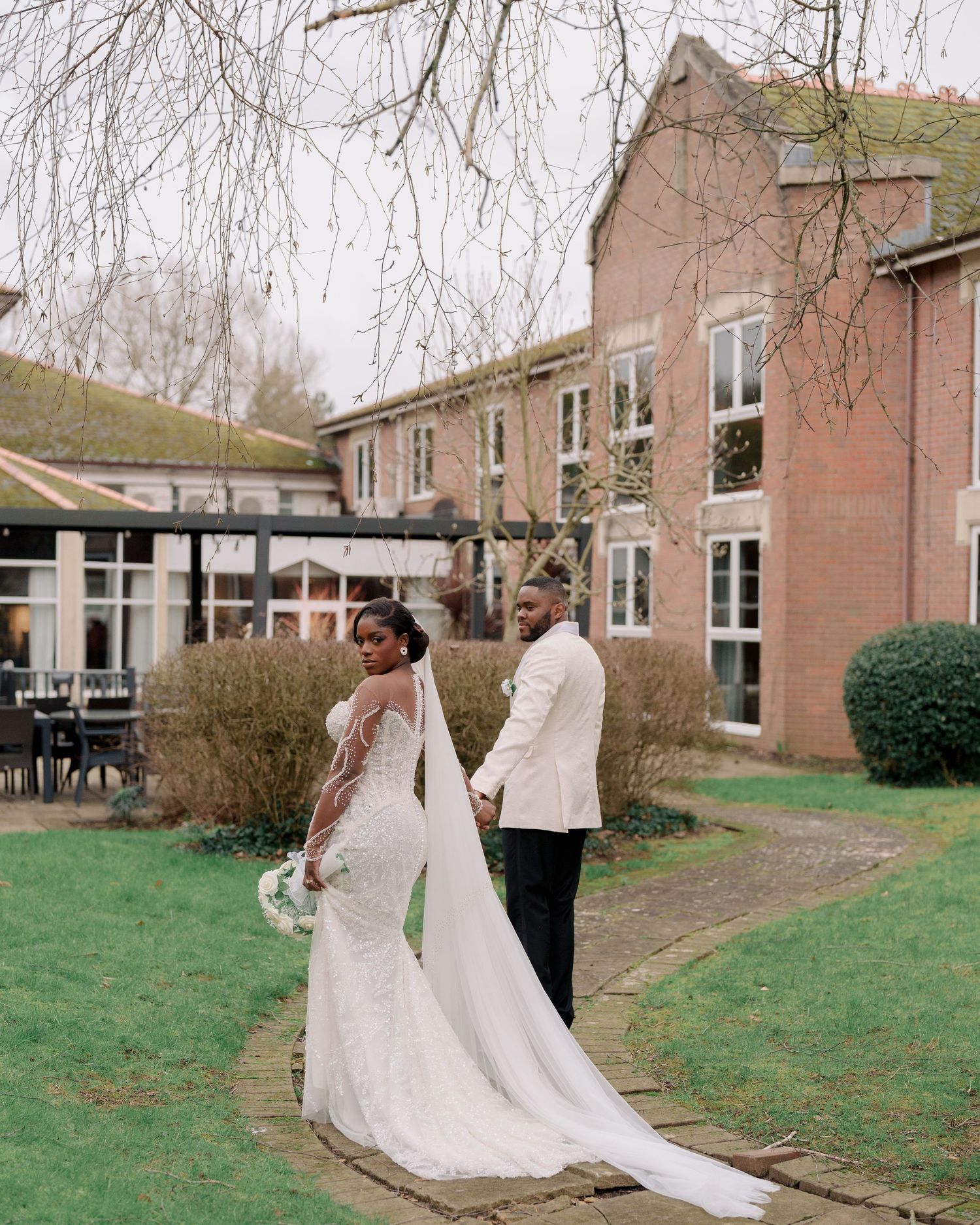 Romantic wedding portrait of bride and groom at an elegant hotel in Wales.