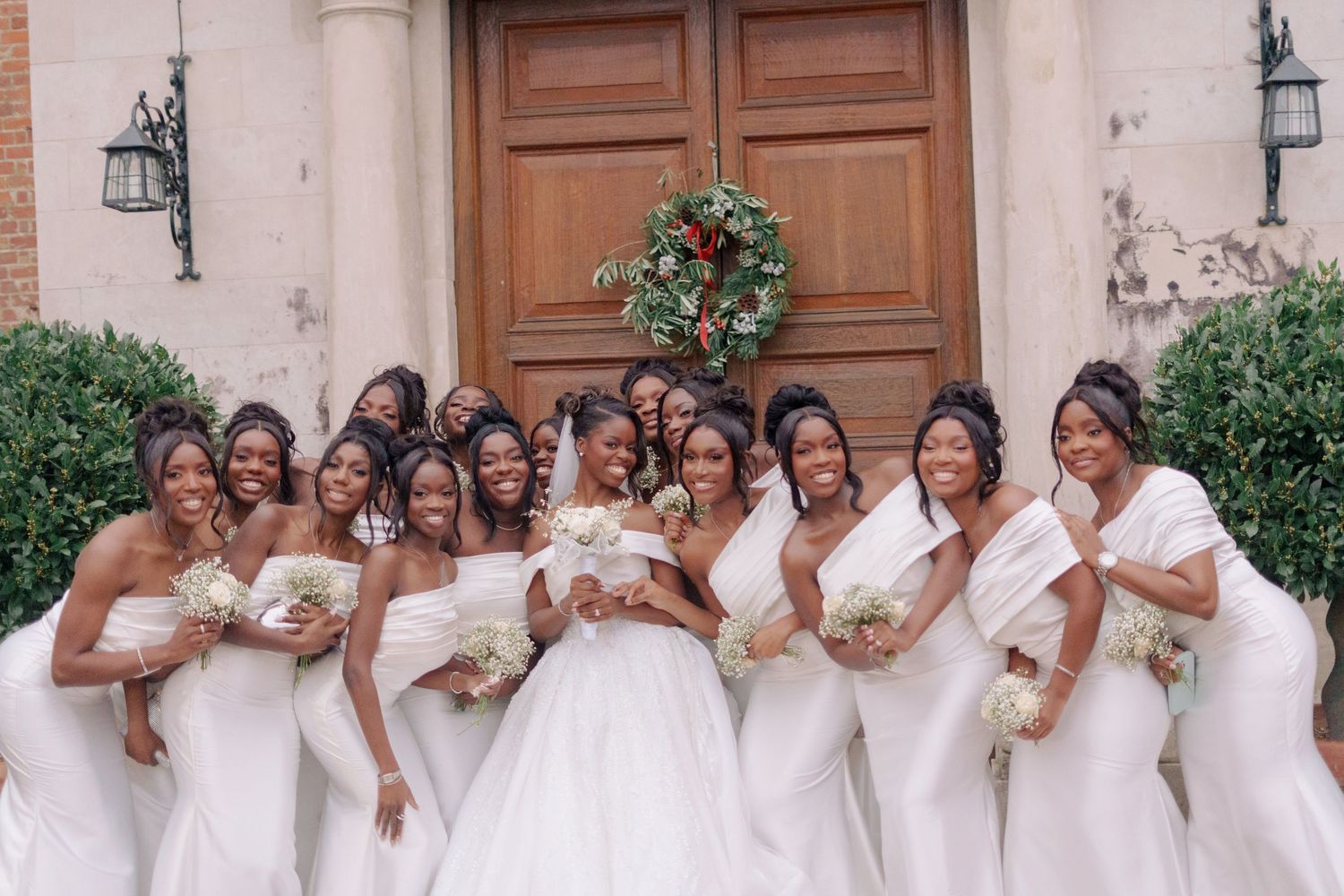 bride and her girls cozying in for a picture.