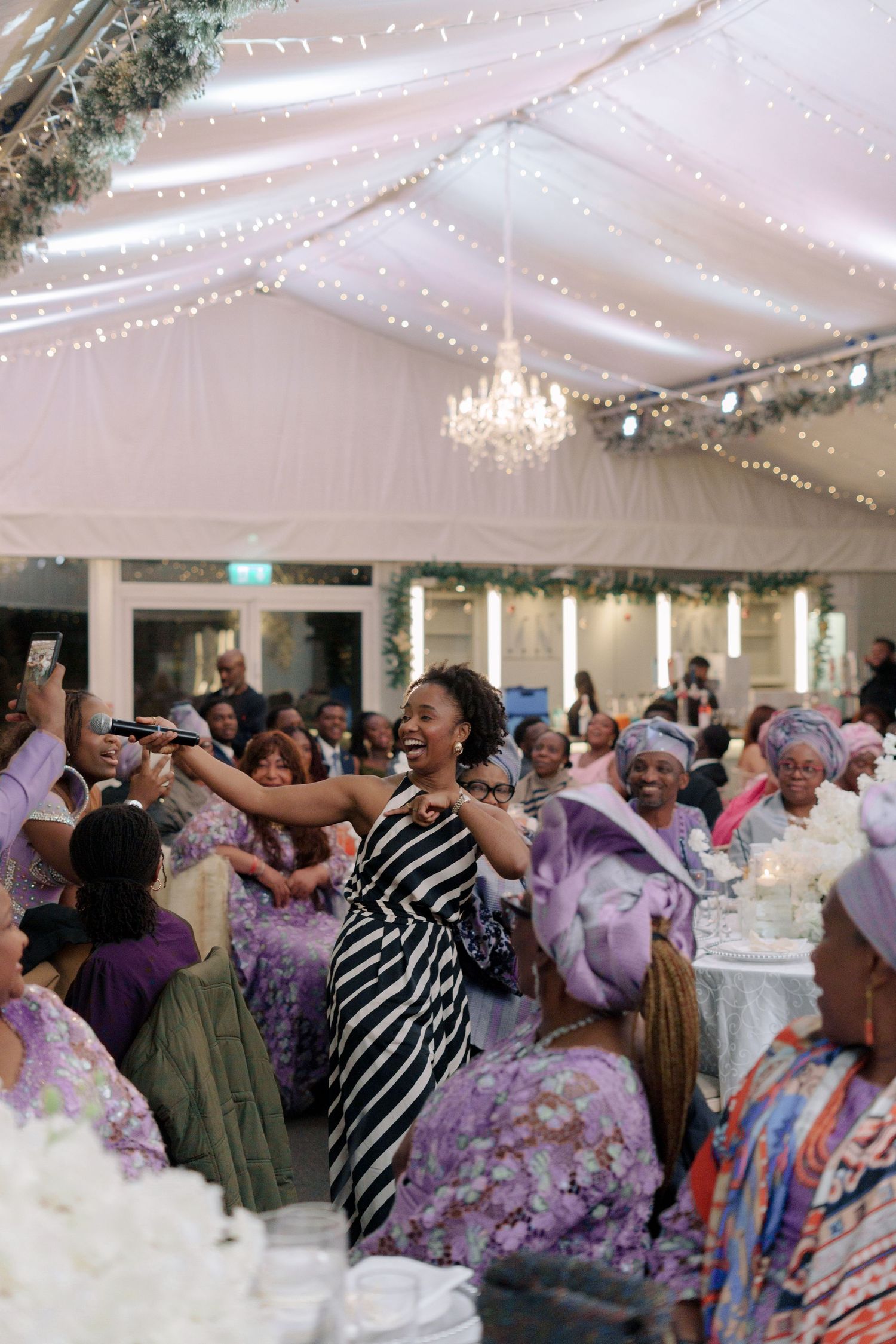 family of couple dancing entrance at wedding recption
