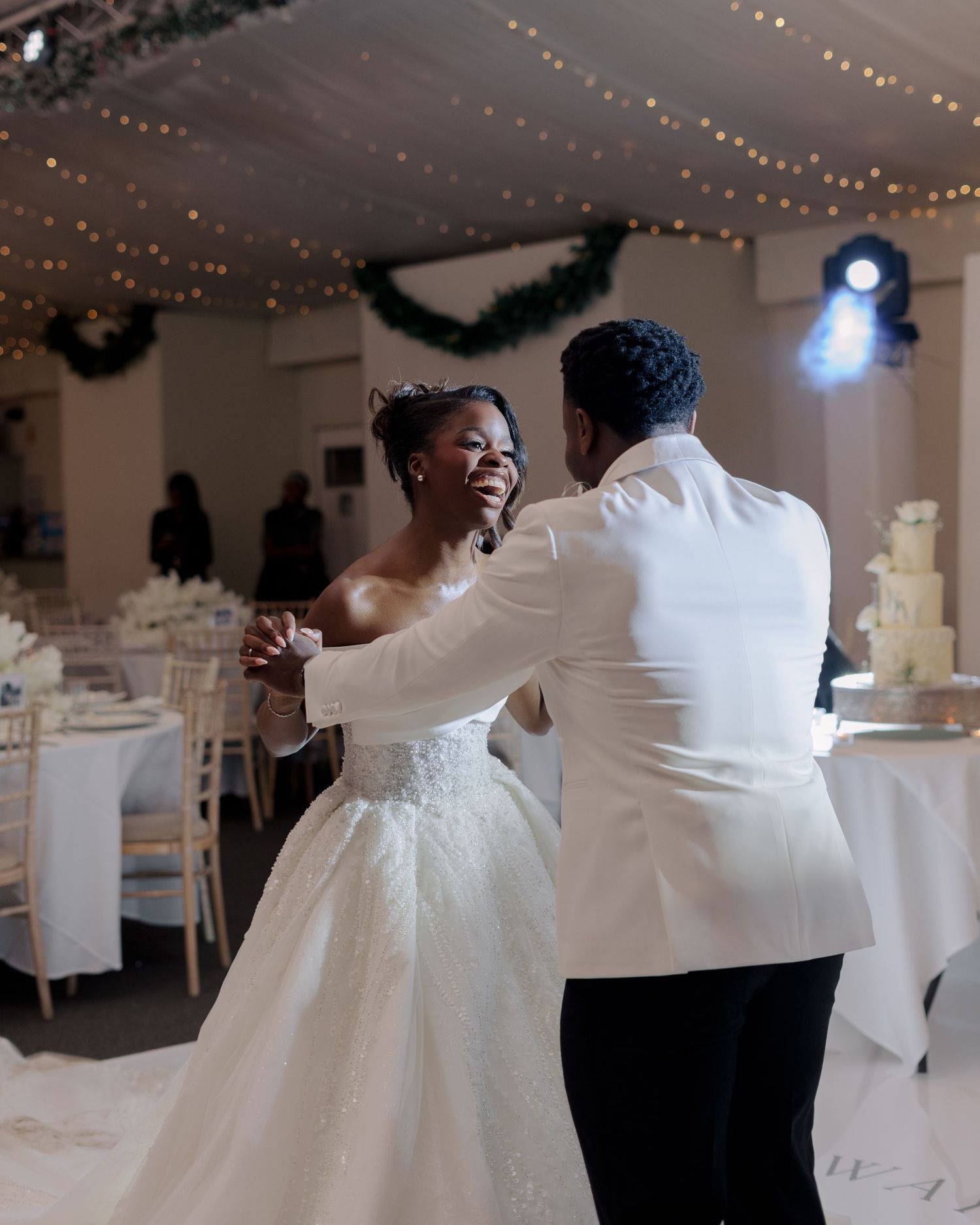 bride and groom dancing