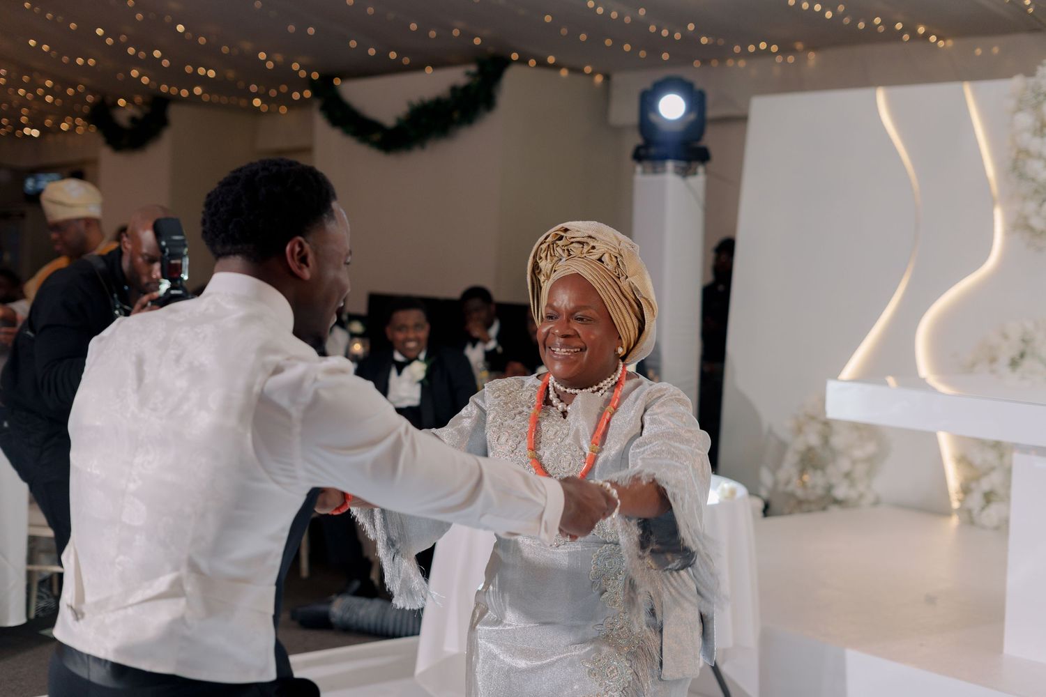 groom dancing with his mother at wedding reception