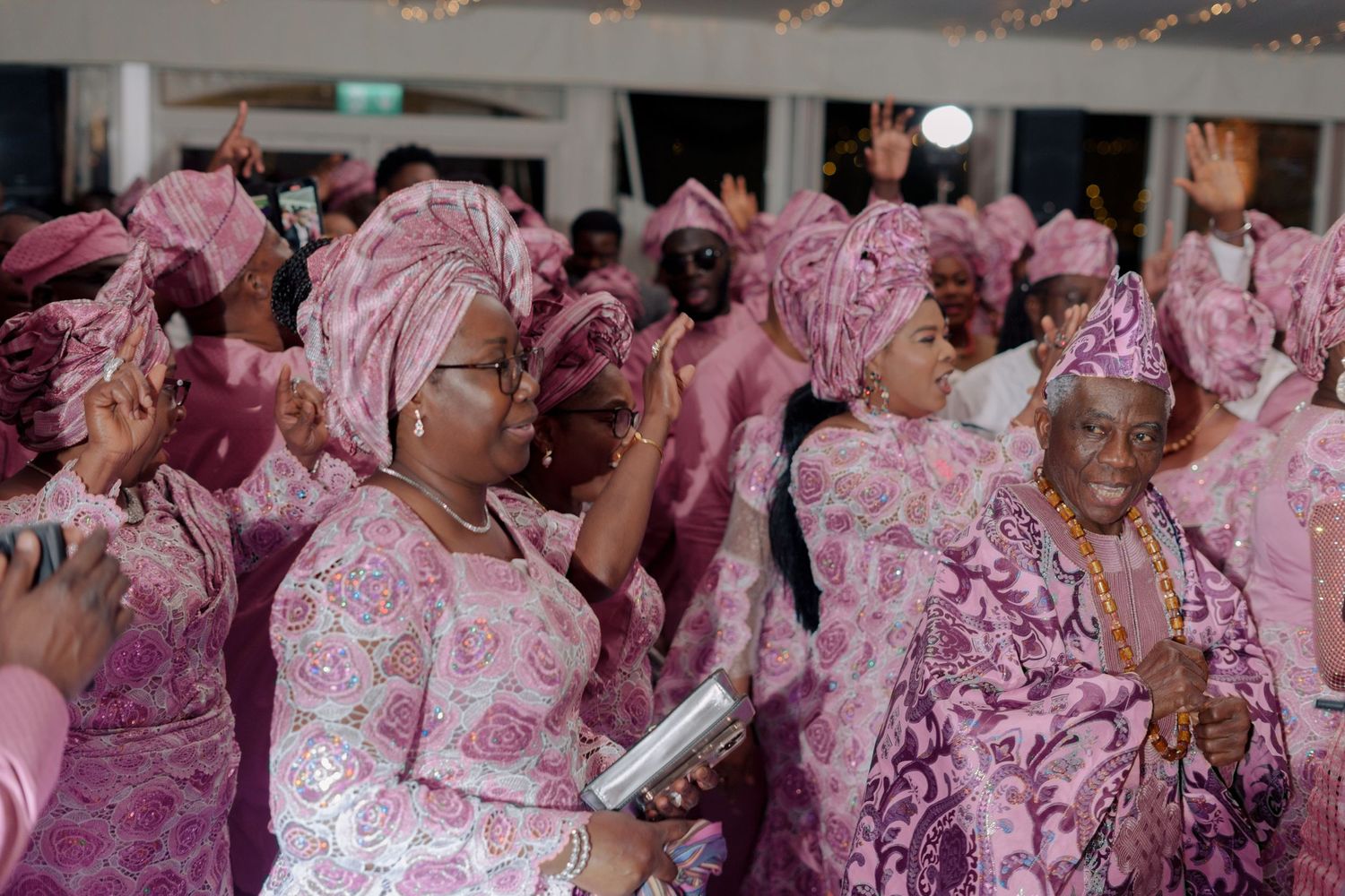family of couple dancing entrance at wedding recption