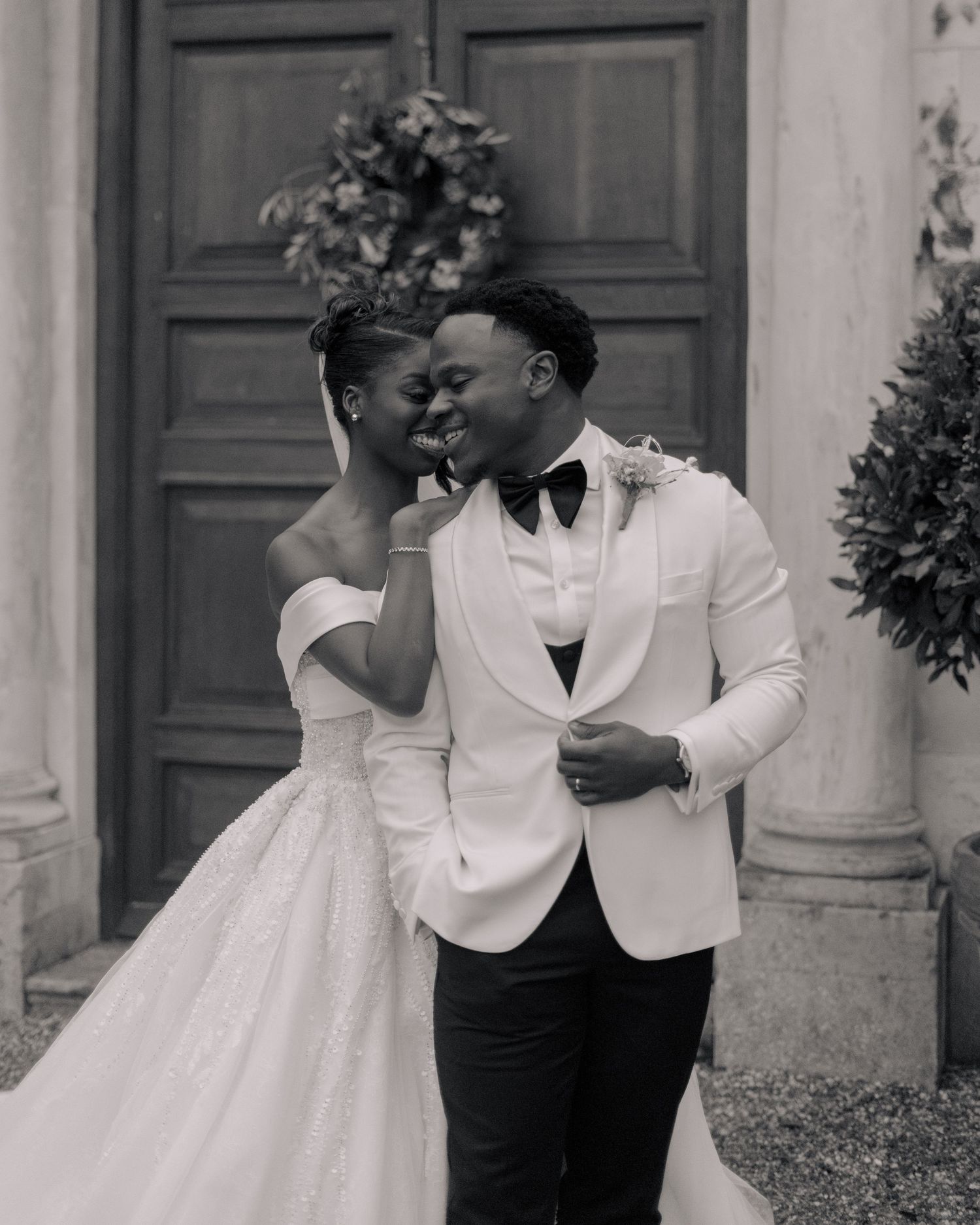 black and white picture of couple posing for a picture