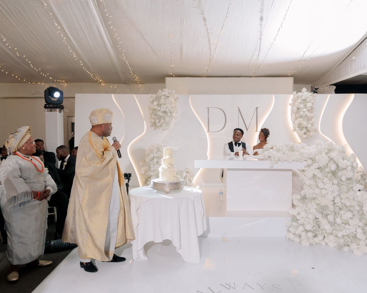 father making speech at reception of wedding