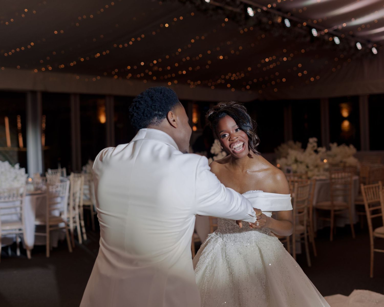 bride and groom dancing