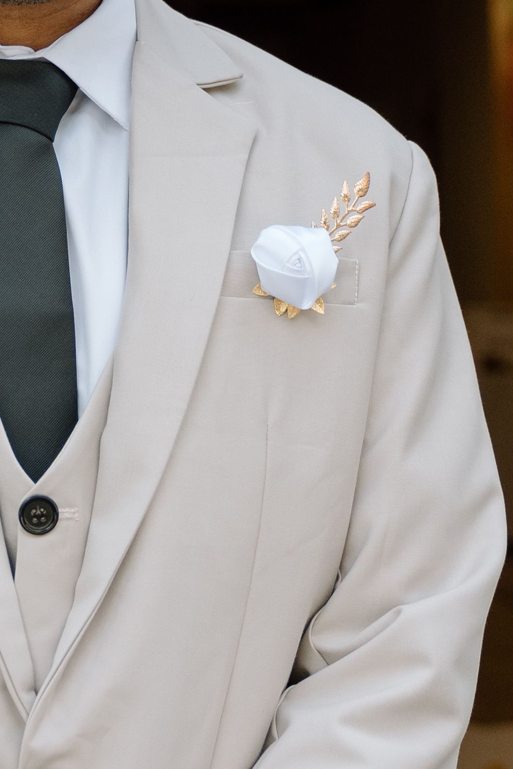 A grooms suit details.