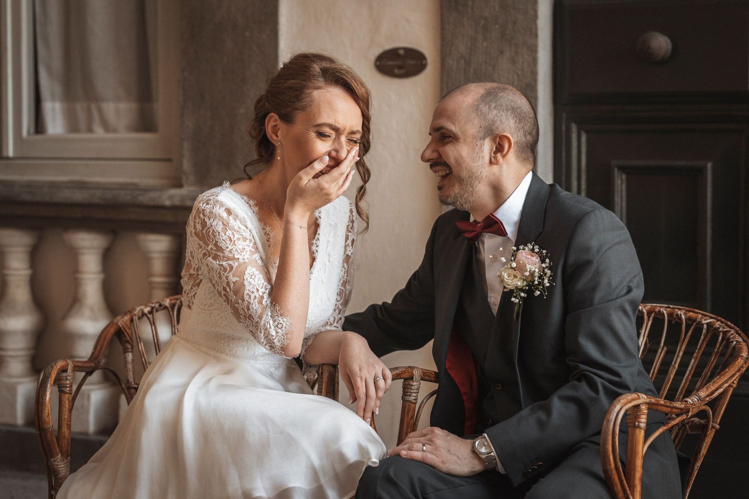 Intimate wedding moments captured in a vintage indoor setting.