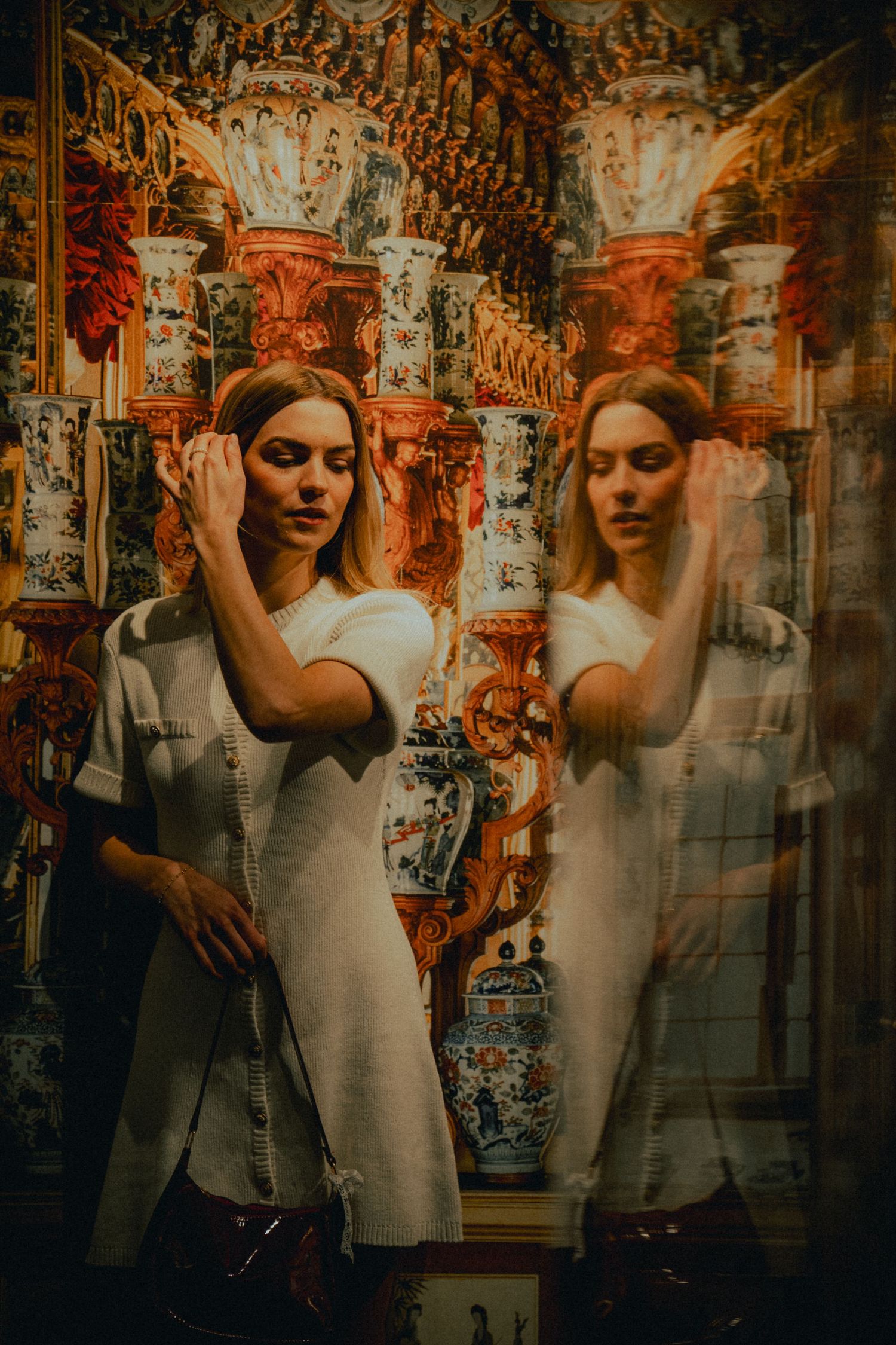 Artistic double exposure portrait series with vintage architectural overlay effects.