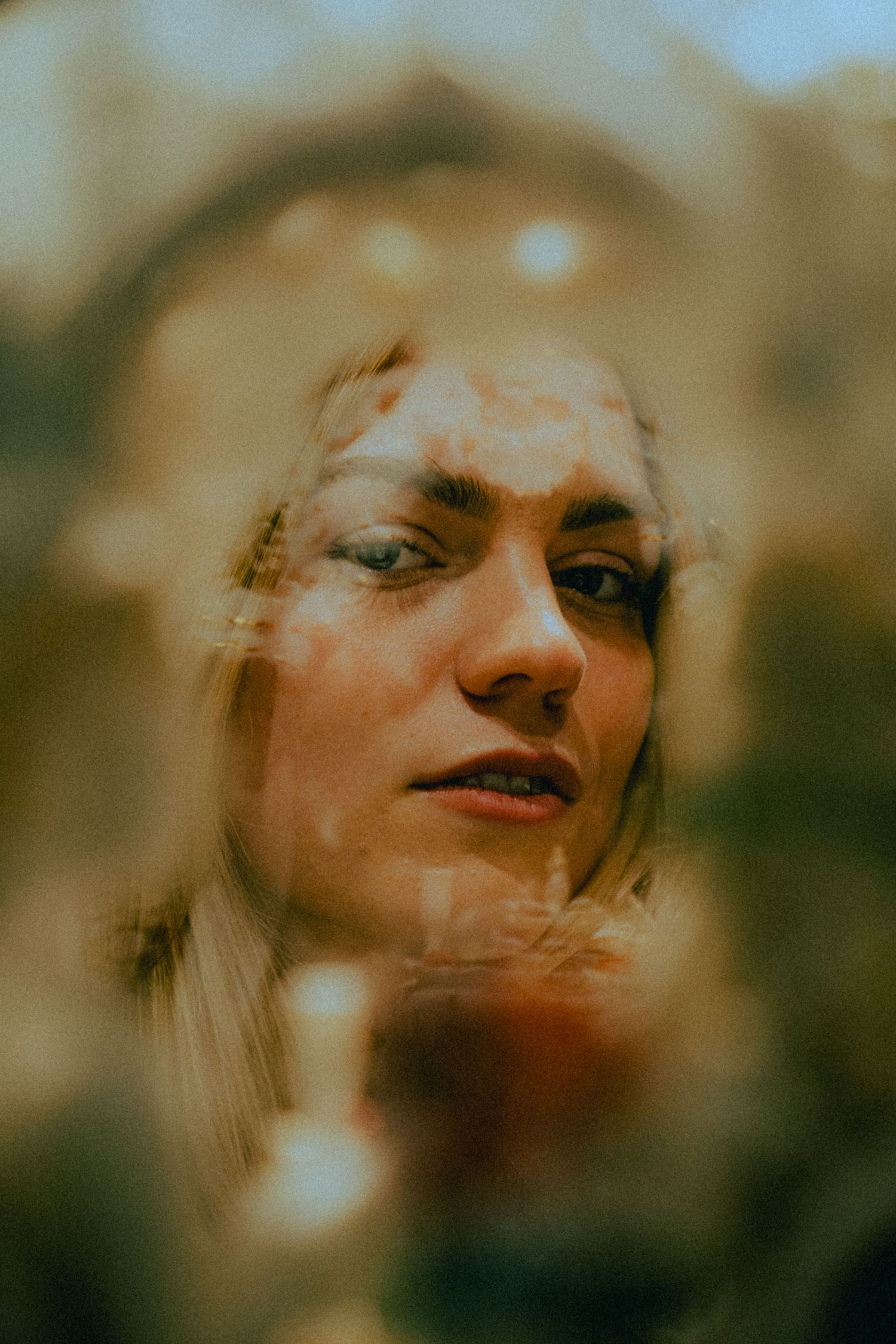 Artistic portrait series with dreamy golden hour lighting and bokeh effects.