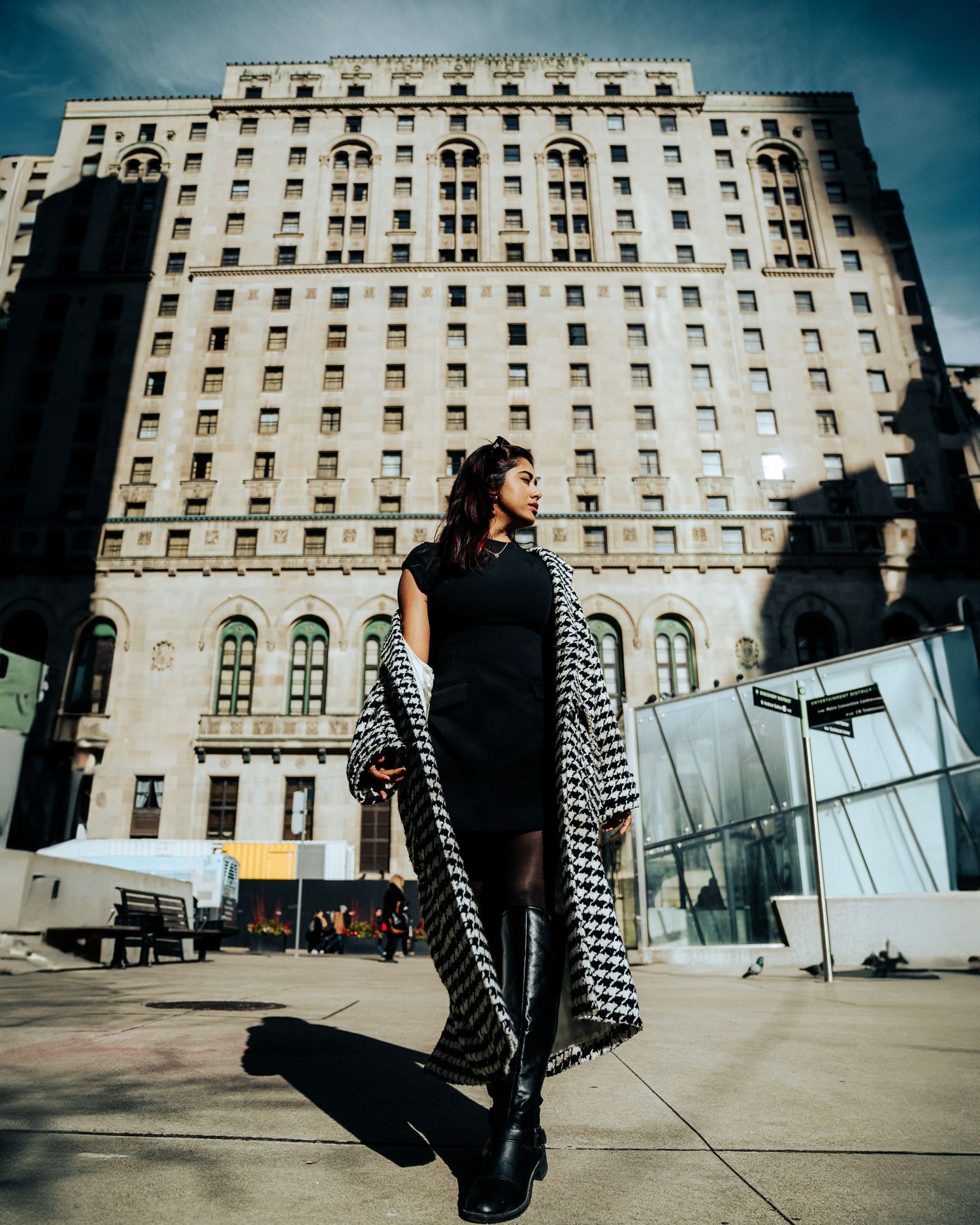 Architectural street photography series showing a modern building facade with glass and stone elements.