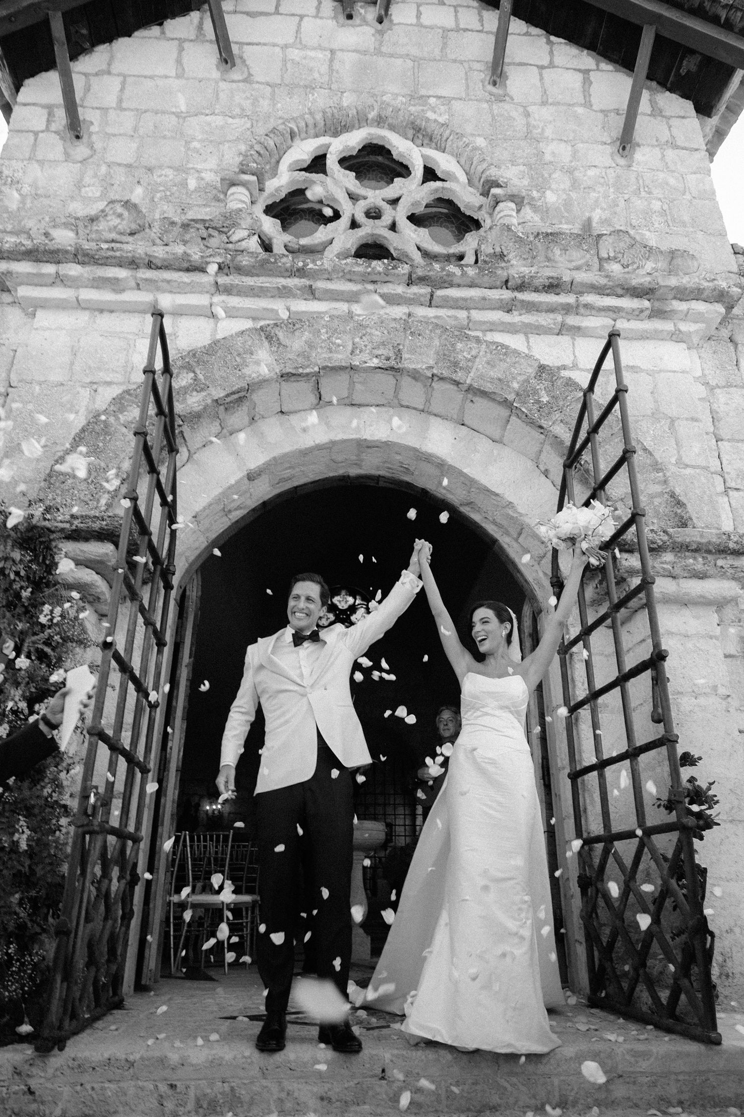 Casa de campo wedding couple exit at church, yilbeel Torres Destination Wedding Photographer.