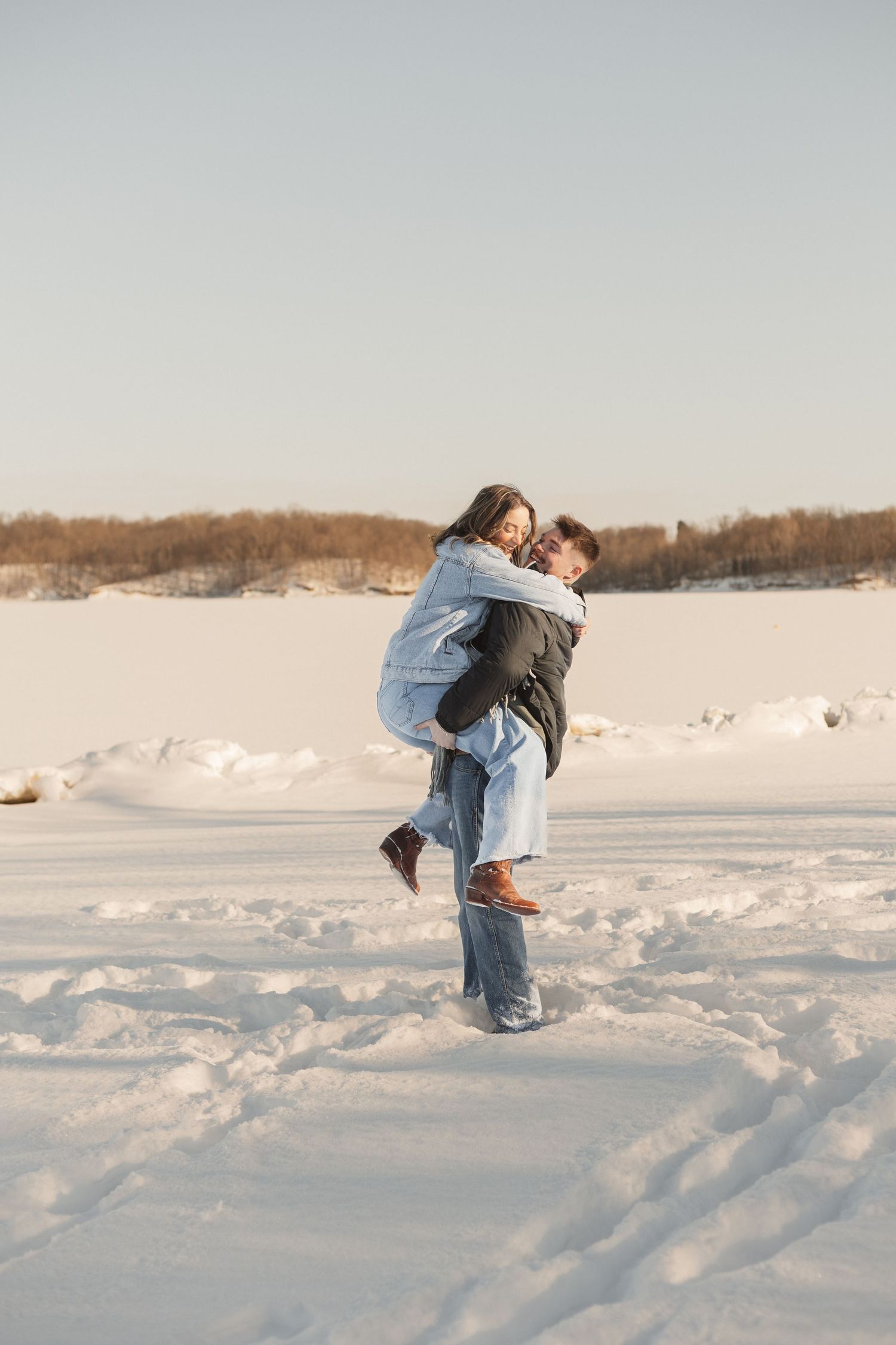 A playful winter moment captured with a lift in the snow.