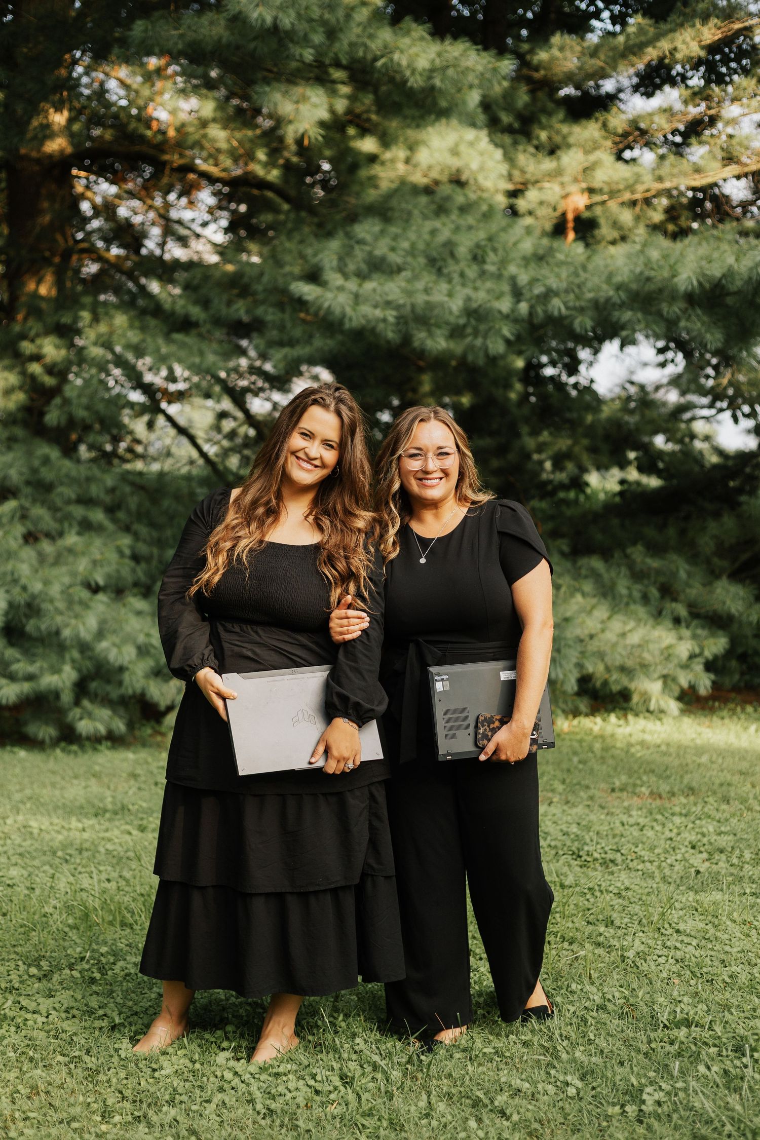 Professional outdoor photo session in a green park setting with natural lighting.