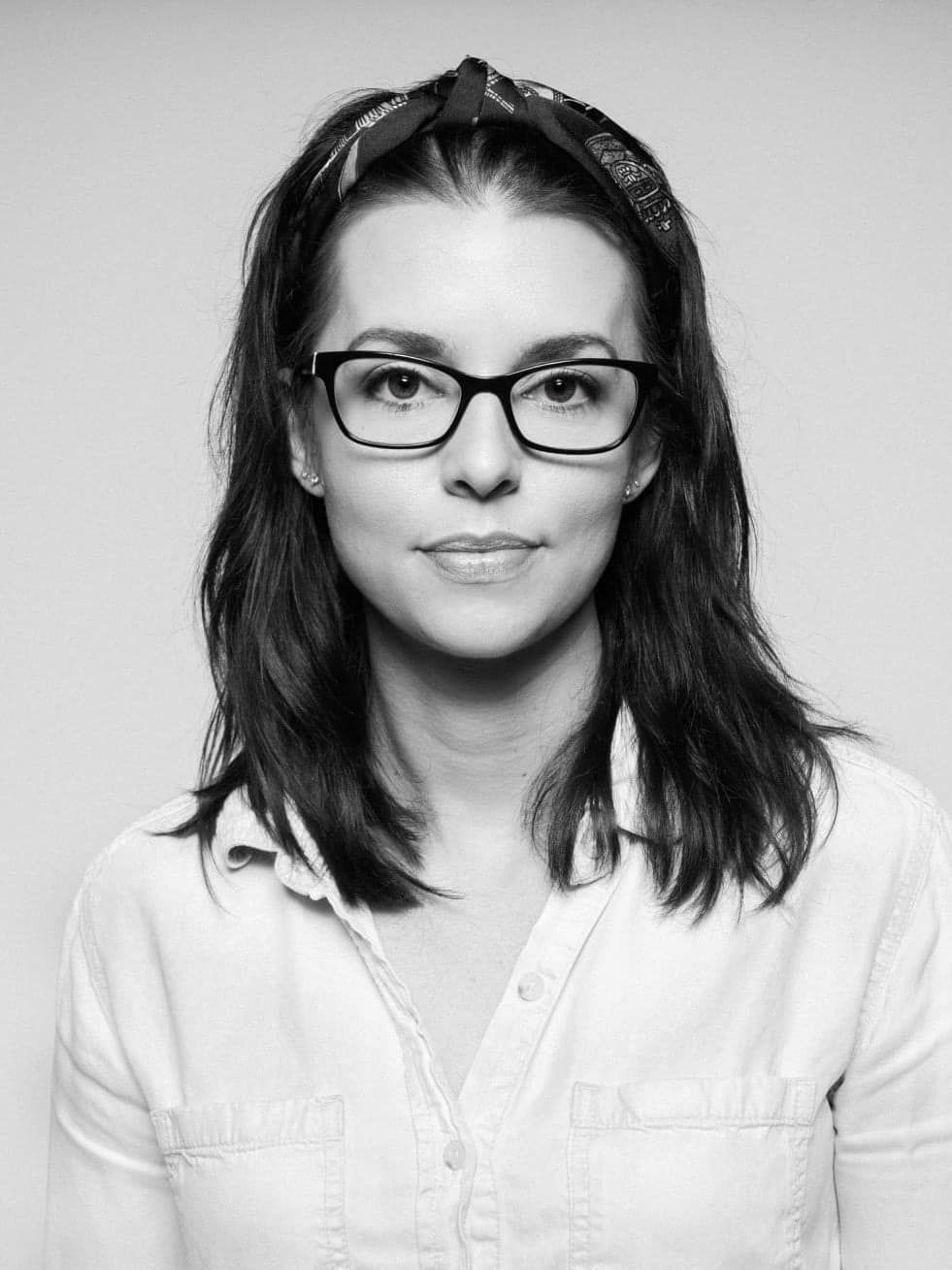 Black and white portrait sequence showing expressions and glasses against light background.