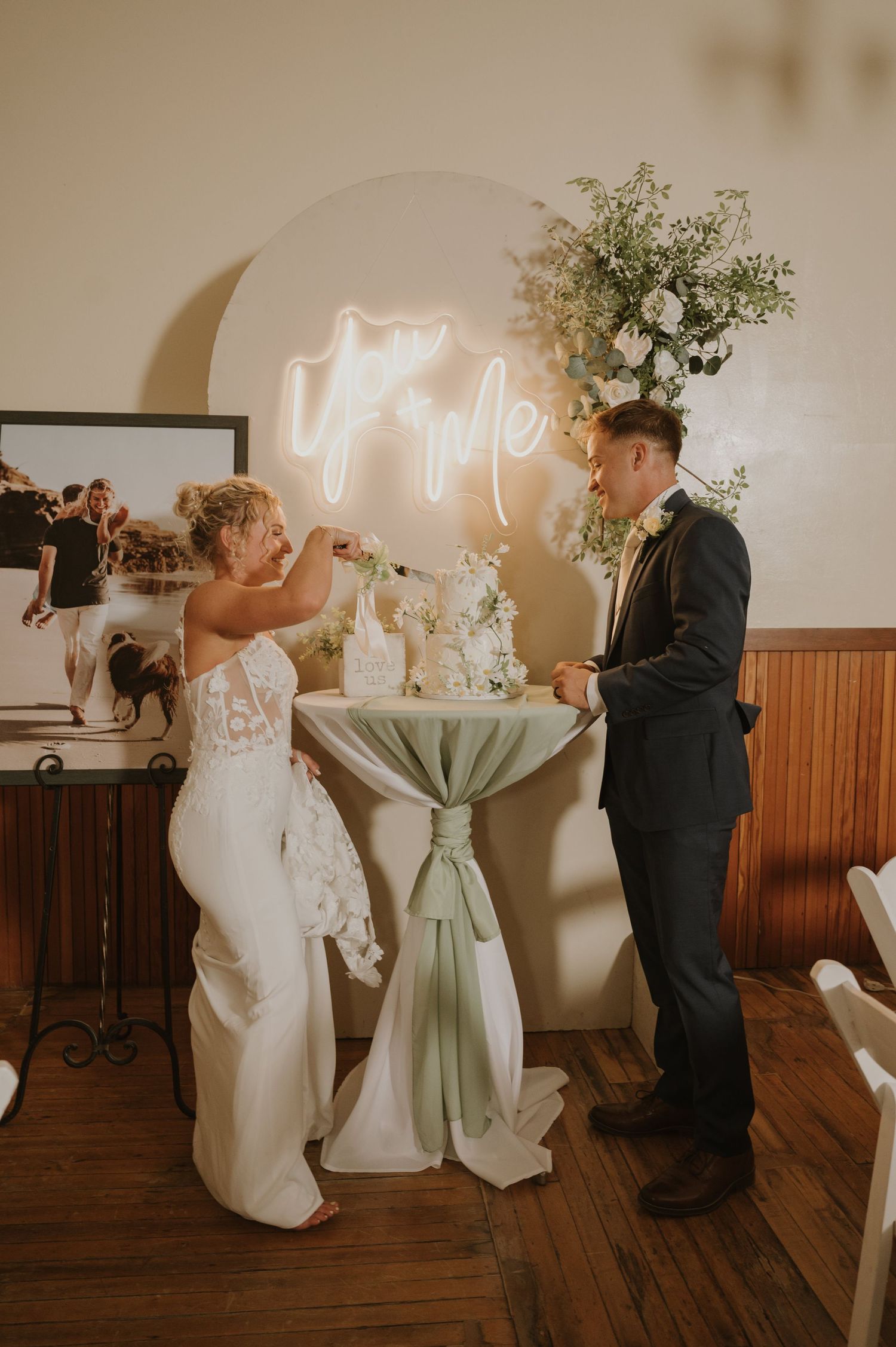 Couple shares playful moments during their wedding reception dance.