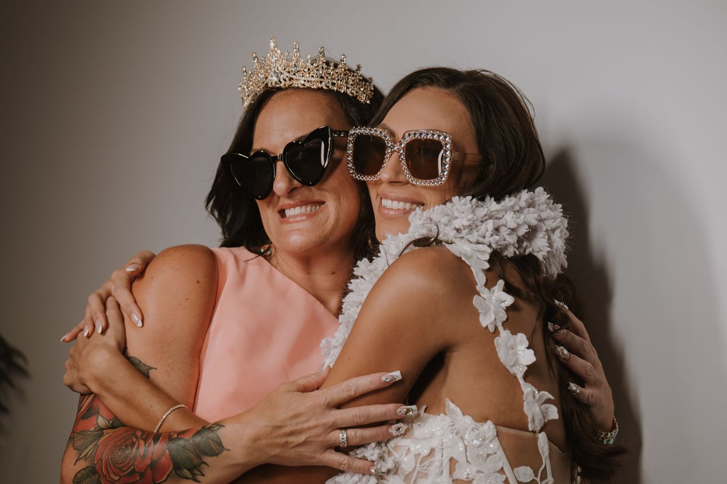 Wedding celebration features fun candid moments with sunglasses and formal attire.