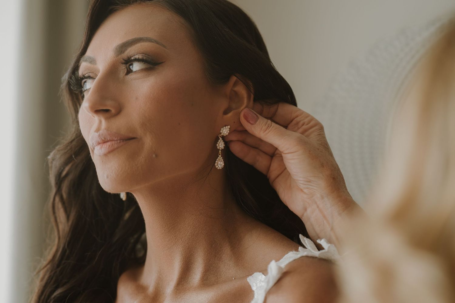 A series of close-up shots showing wedding day jewelry and accessory details.