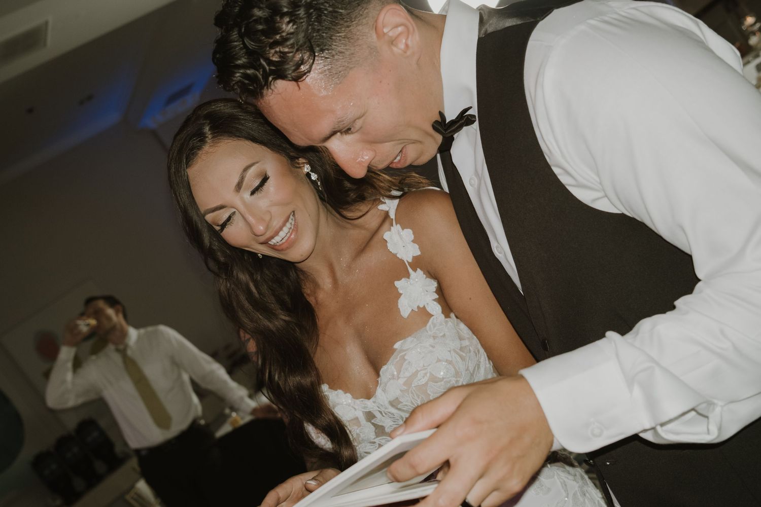 Romantic dance moments captured during an evening wedding reception.