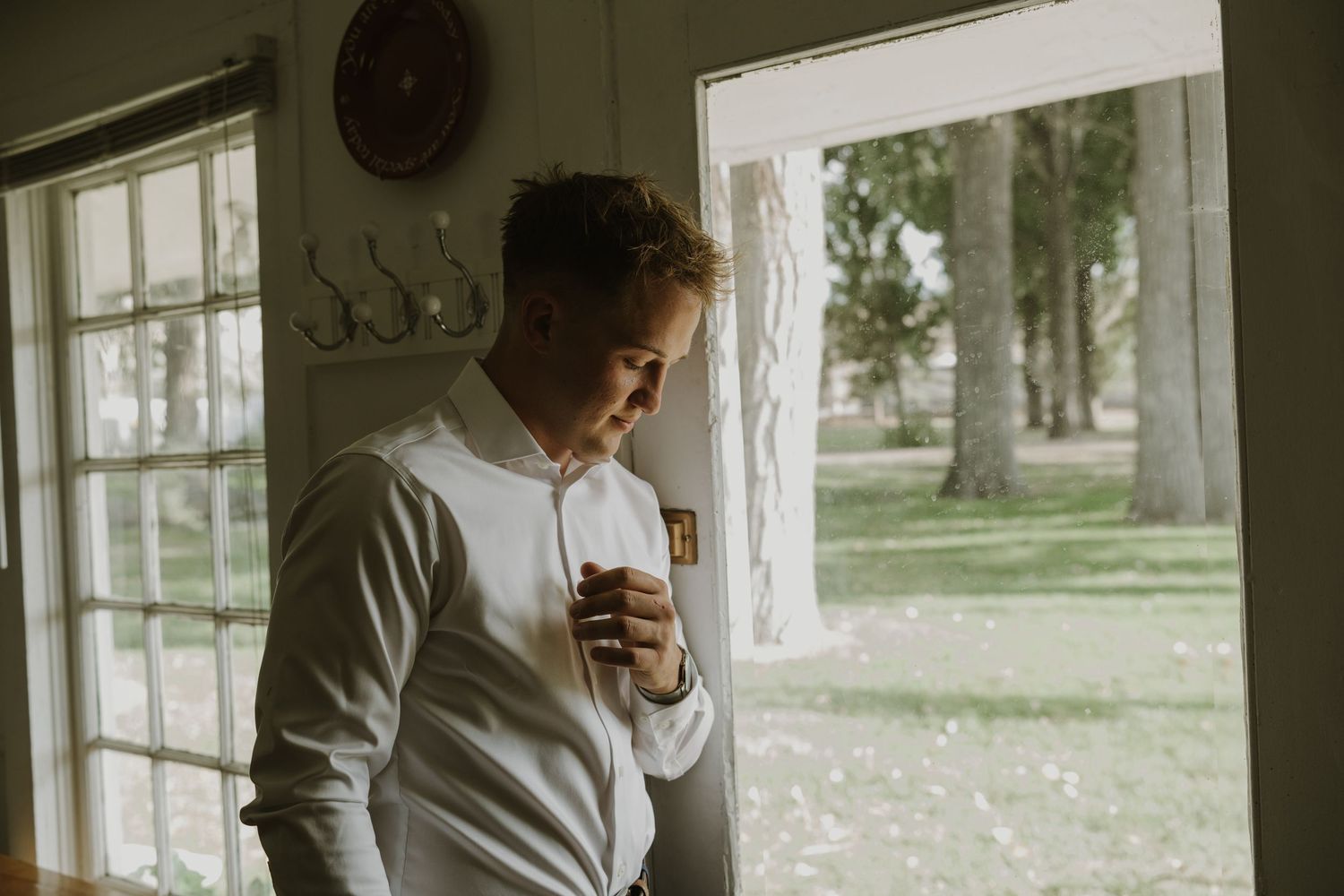 Interior shots showing silhouettes against bright windows in a rustic setting.