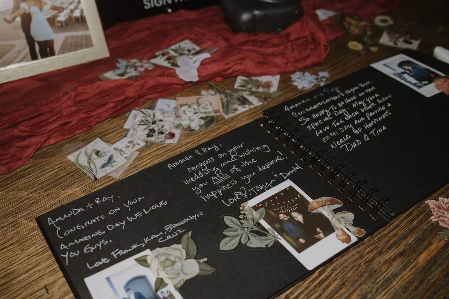 Chalkboard signs with handwritten messages displayed on a wooden surface.
