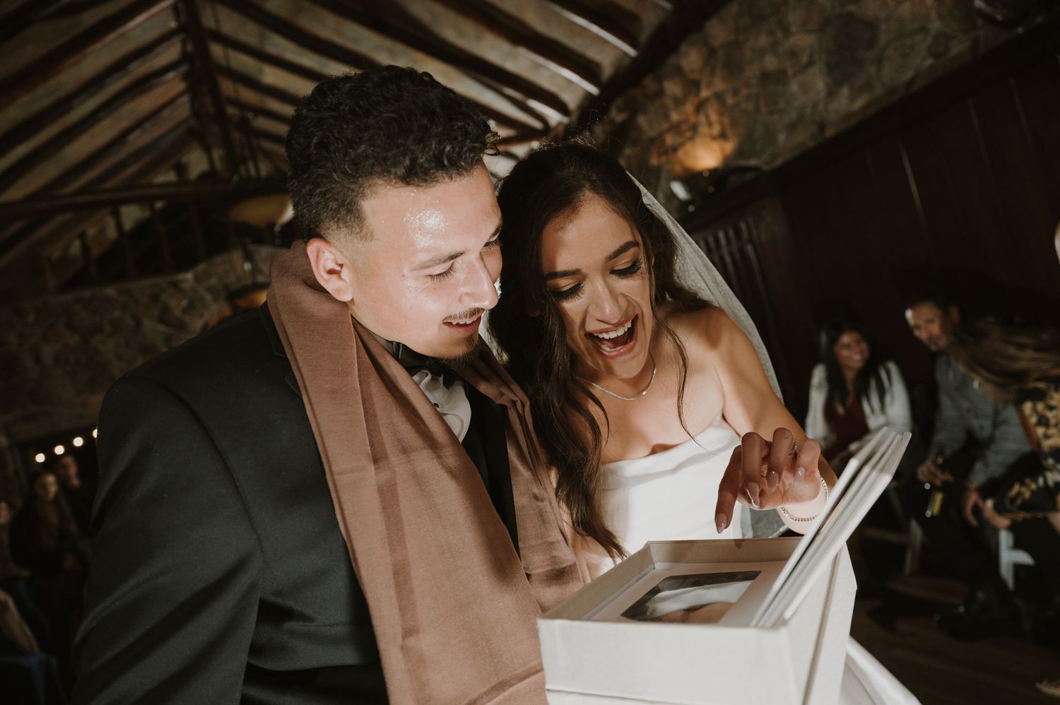 Newlyweds share an intimate moment on the dance floor at their reception.