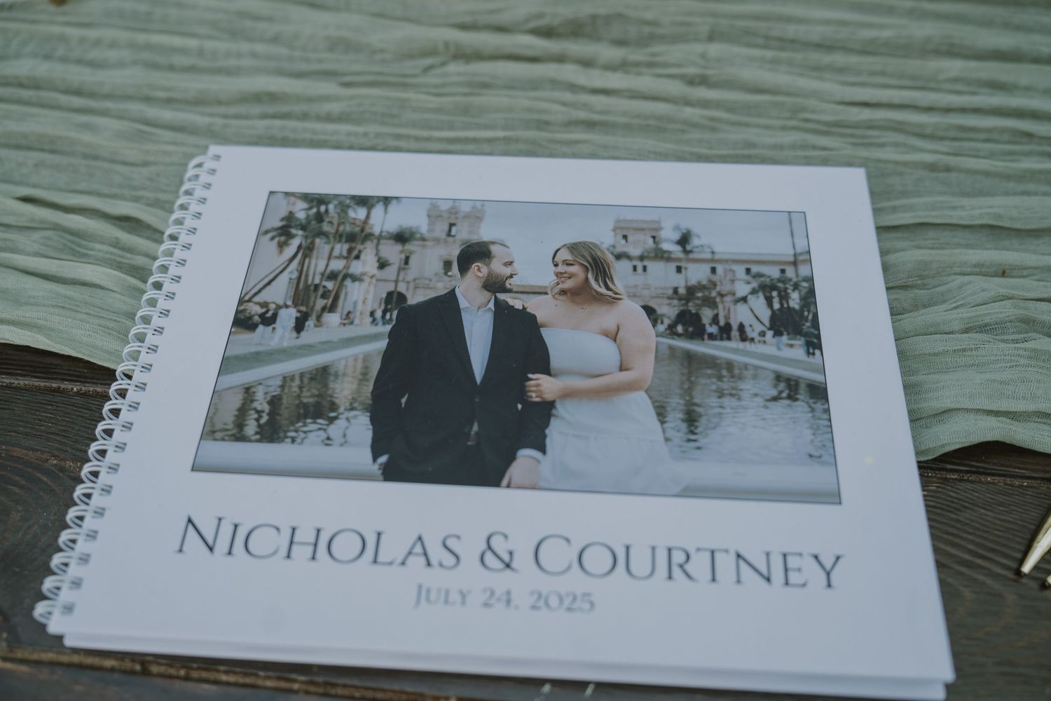 Wedding guest book for Nicholas and Courtney dated July 24, 2025 with couple photo on cover.